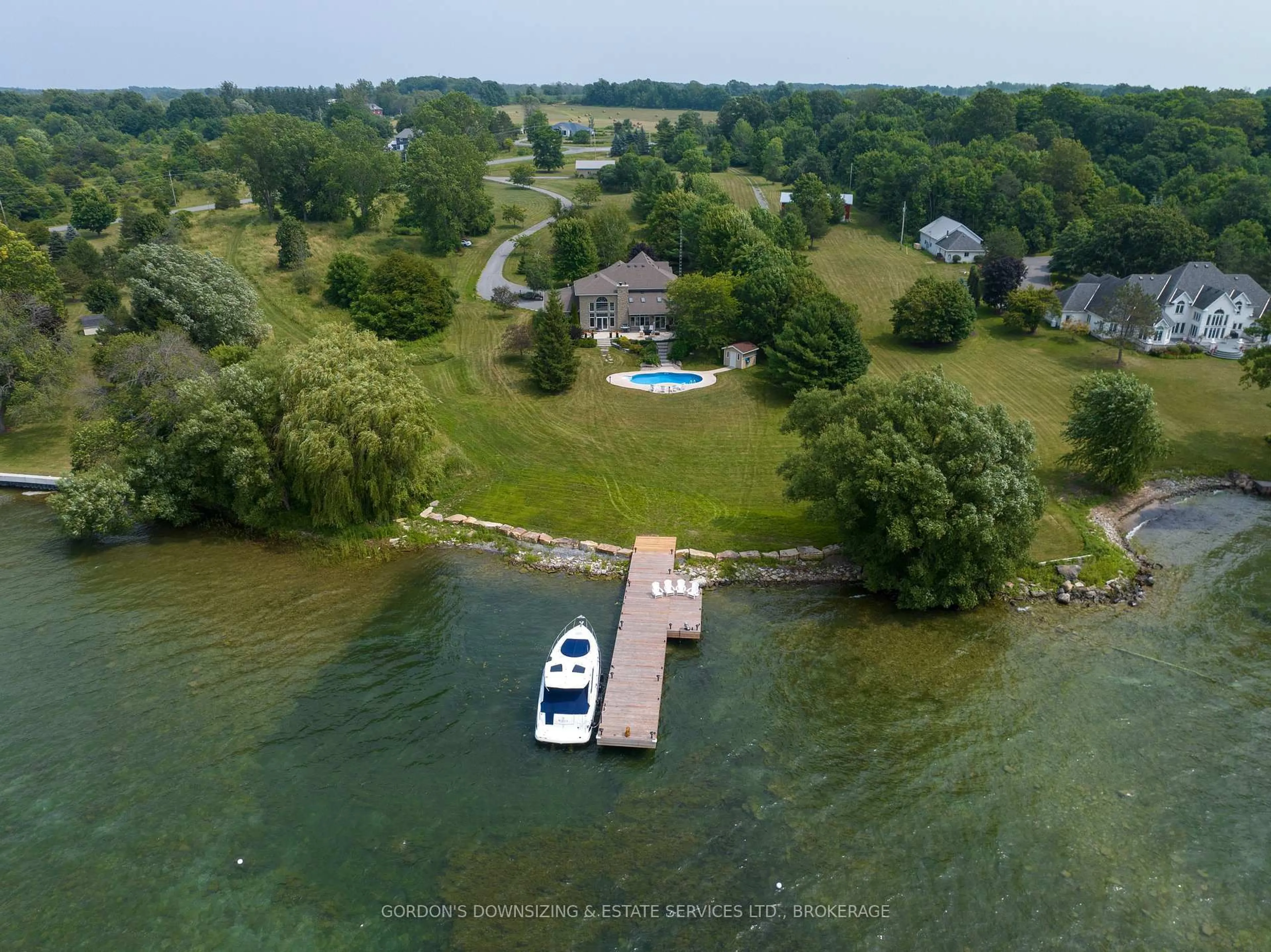 A pic from outside/outdoor area/front of a property/back of a property/a pic from drone, water/lake/river/ocean view for 44 Howe Island Dr, Gananoque Ontario K7G 2V6