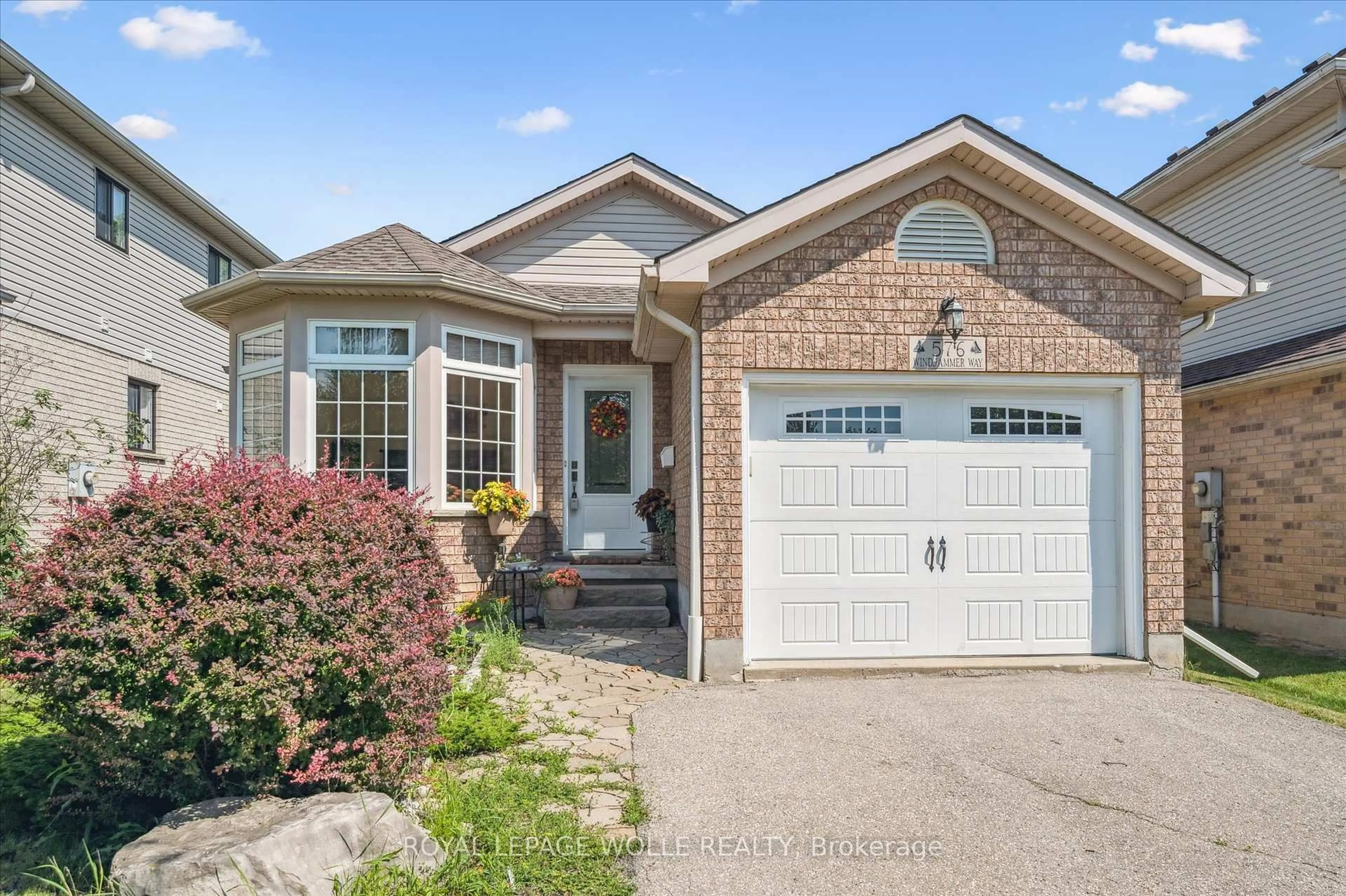 Home with brick exterior material, street for 576 Windjammer Way, Waterloo Ontario N2K 3Z5