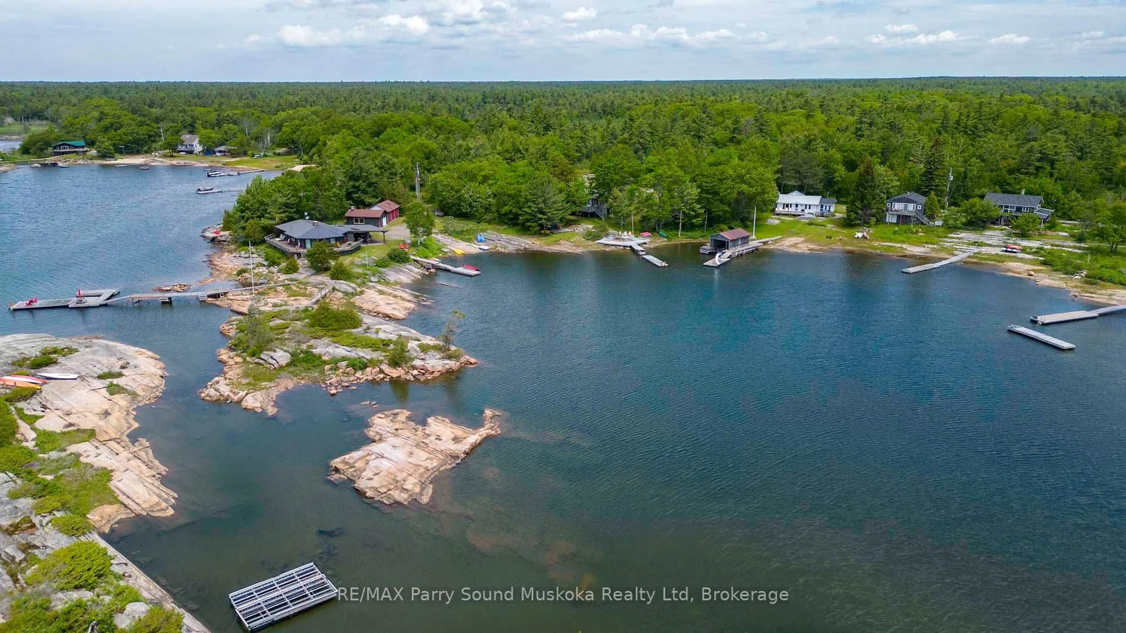 A pic from outside/outdoor area/front of a property/back of a property/a pic from drone, water/lake/river/ocean view for 3 Forsyth's Rd, Carling Ontario P0G 1G0