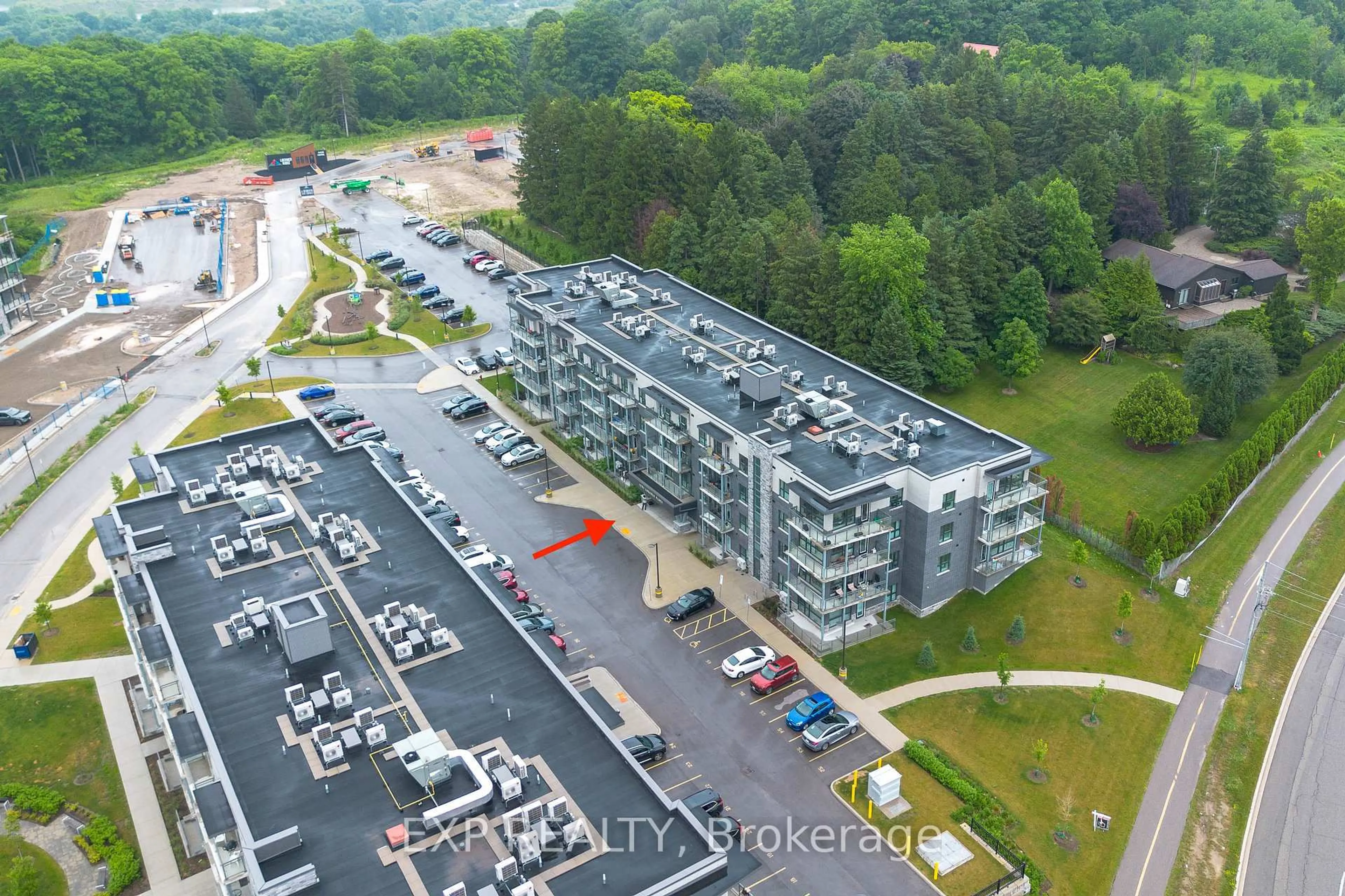 A pic from outside/outdoor area/front of a property/back of a property/a pic from drone, building for 1201 Lackner Pl #211, Kitchener Ontario N2A 0L4