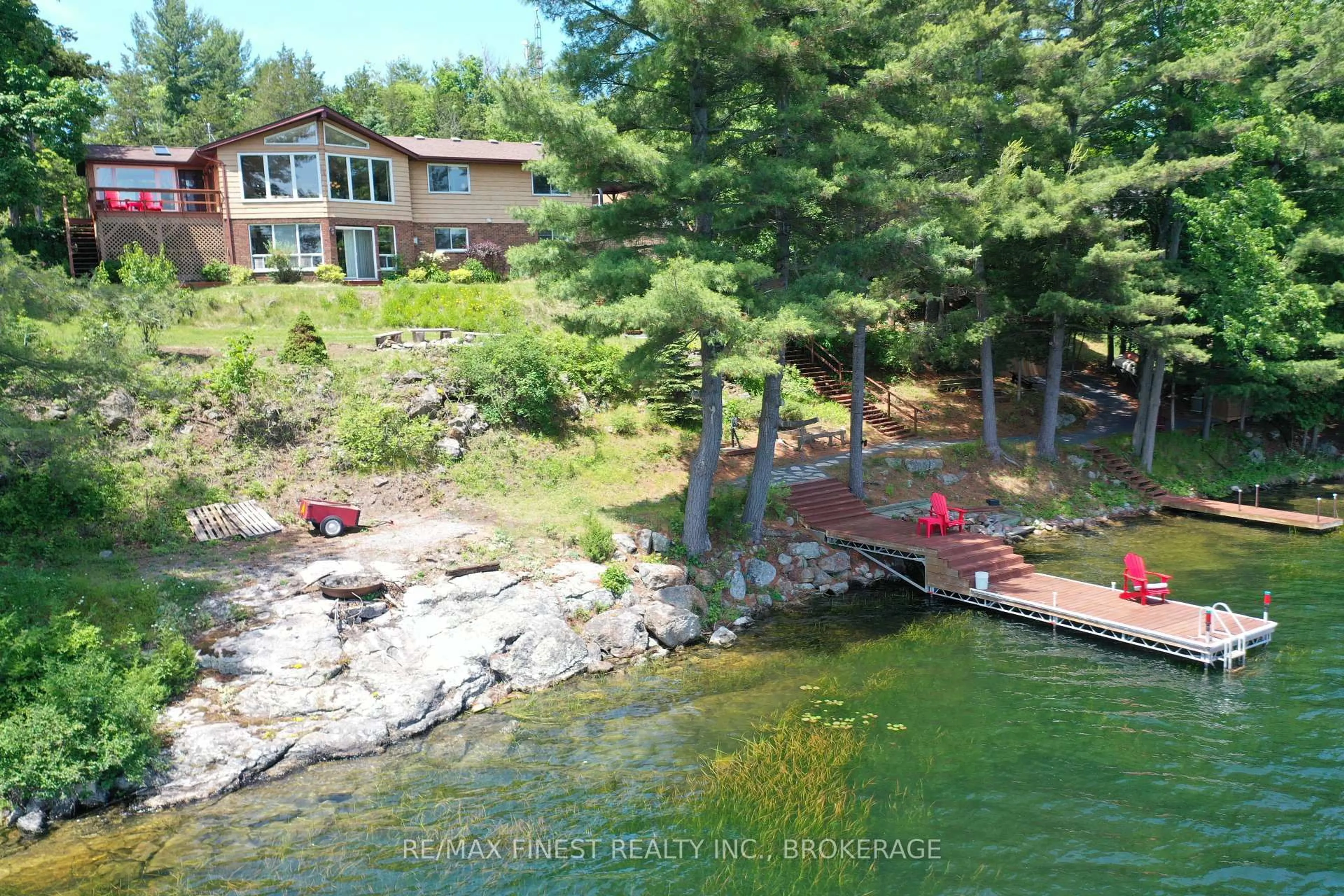 A pic from outside/outdoor area/front of a property/back of a property/a pic from drone, water/lake/river/ocean view for 3037 Hilltop Lane, Perth Road Ontario K0H 2L0