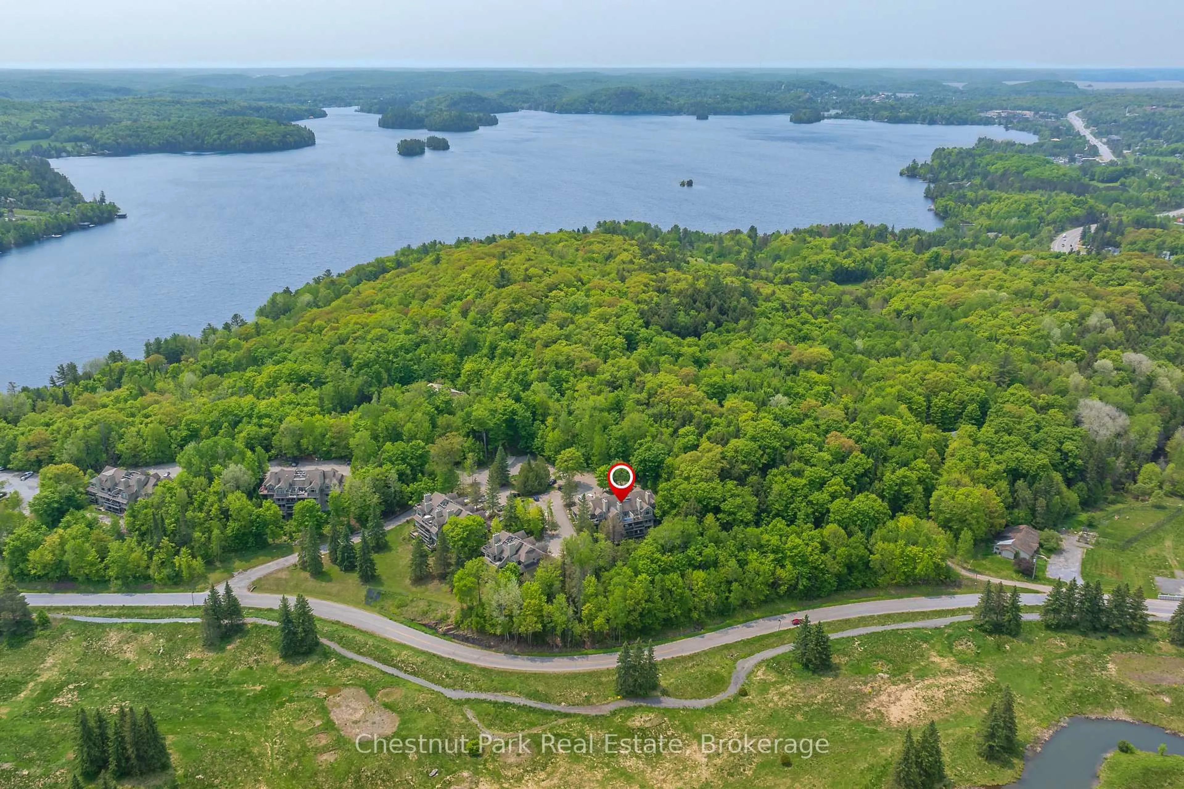 A pic from outside/outdoor area/front of a property/back of a property/a pic from drone, water/lake/river/ocean view for 3831 Grandview Forest Hill Dr, Huntsville Ontario P1H 2J5