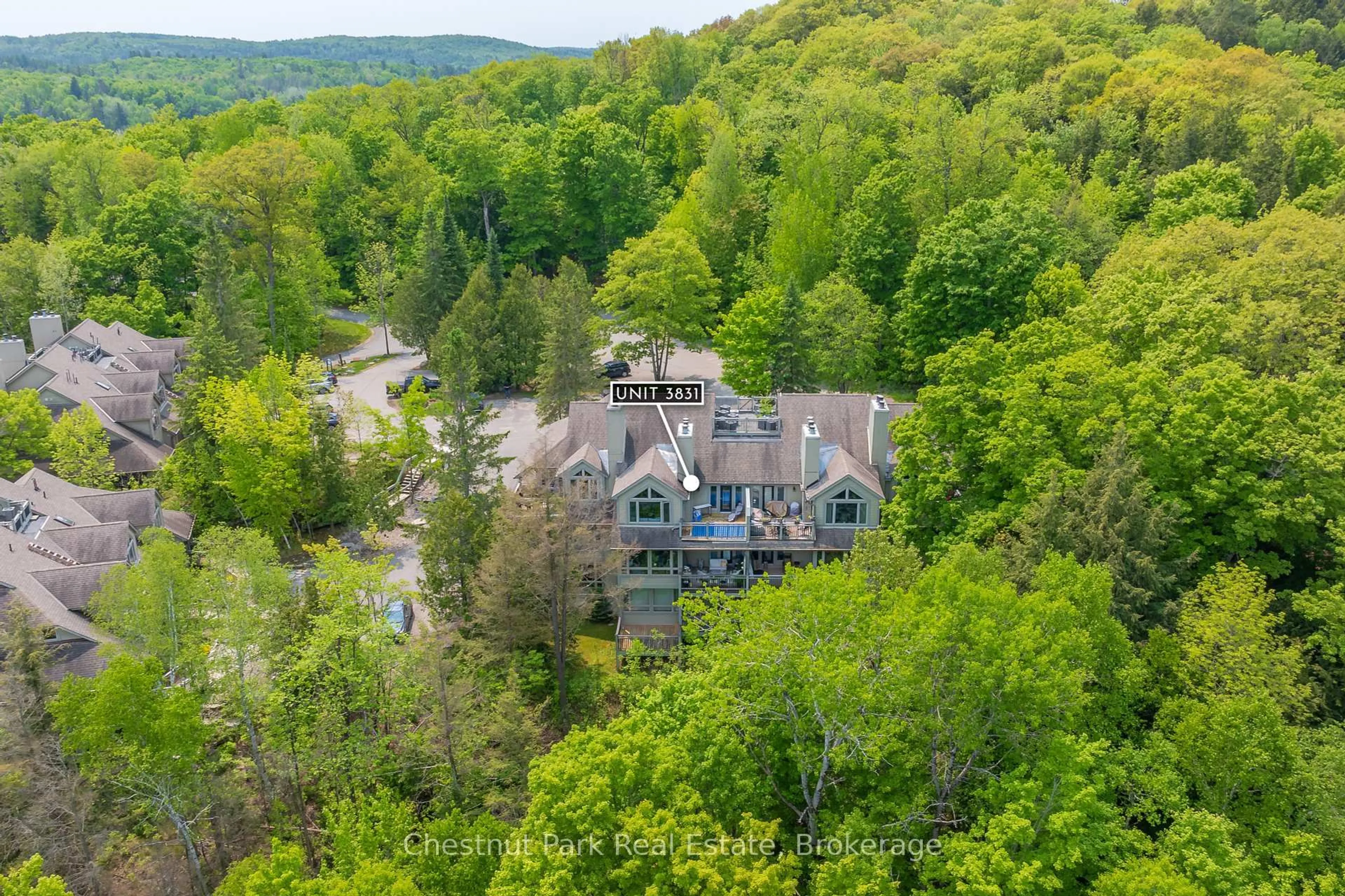 A pic from outside/outdoor area/front of a property/back of a property/a pic from drone, forest/trees view for 3831 Grandview Forest Hill Dr, Huntsville Ontario P1H 2J5