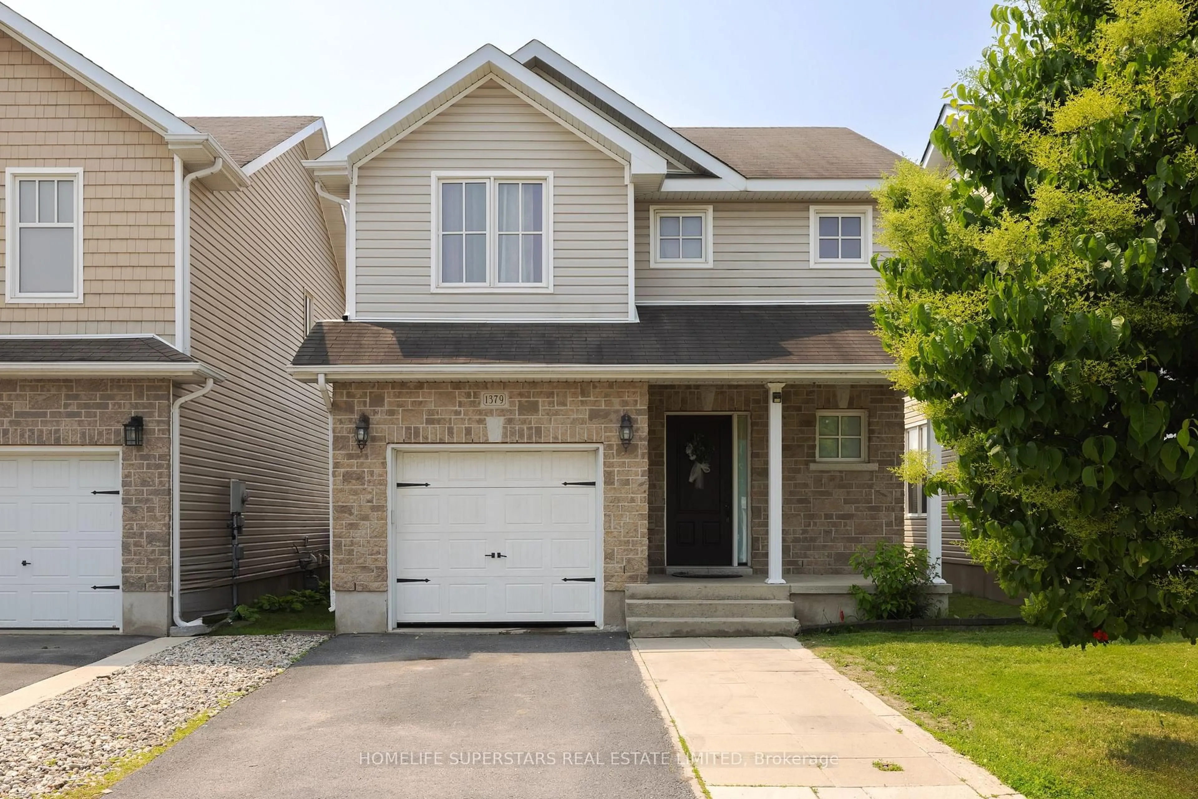 Home with vinyl exterior material, street for 1379 Atkinson St, Kingston Ontario K7P 0C4