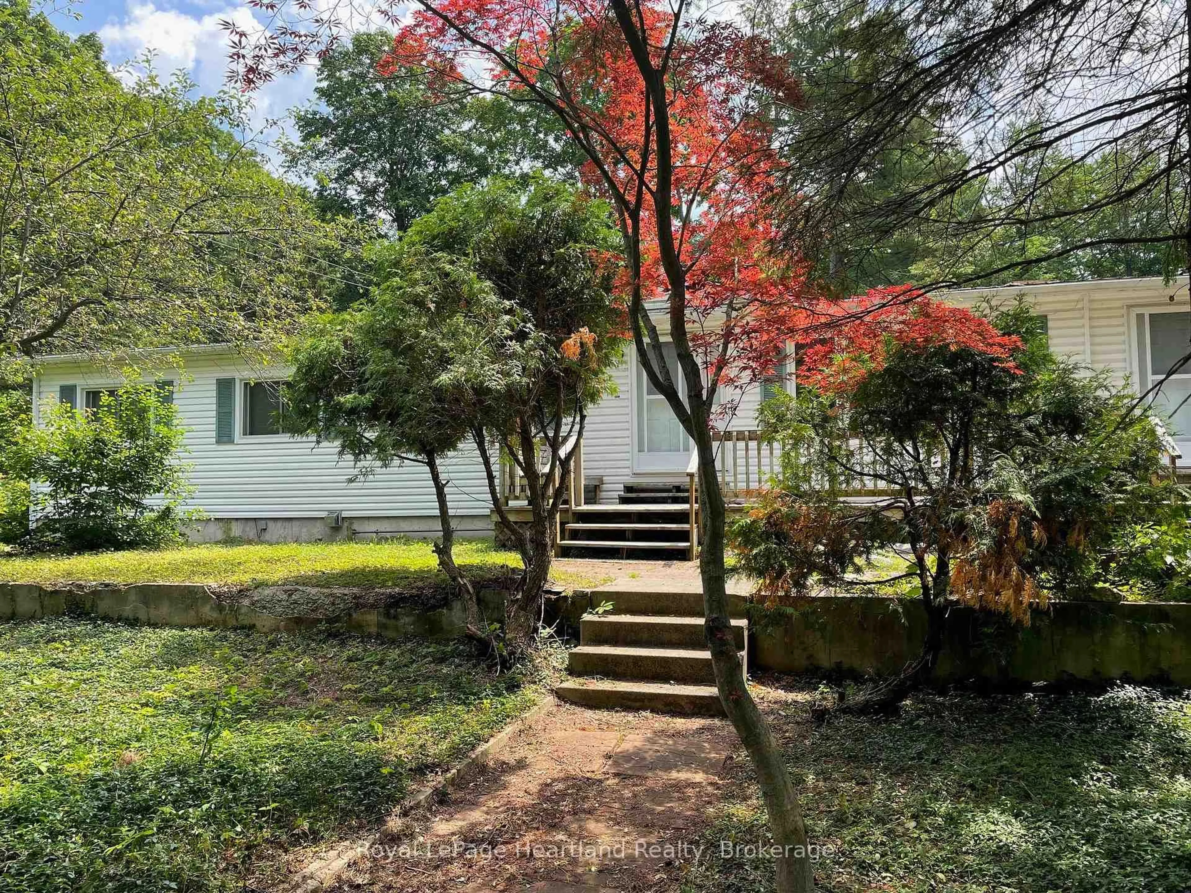 A pic from outside/outdoor area/front of a property/back of a property/a pic from drone, forest/trees view for 35791 Bayfield River Rd #902 White Cedar Dr., Central Huron Ontario N0M 1G0