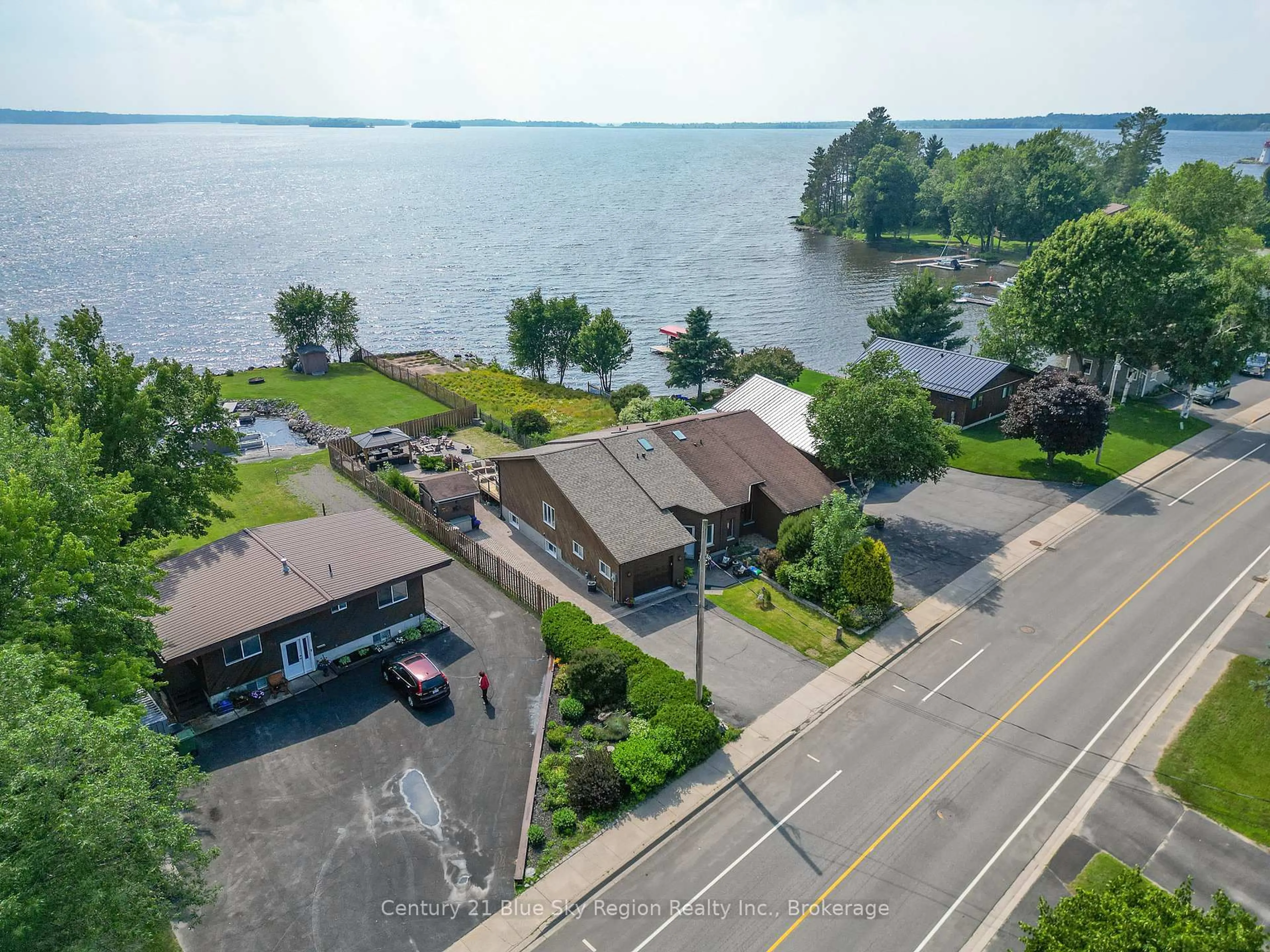 A pic from outside/outdoor area/front of a property/back of a property/a pic from drone, water/lake/river/ocean view for 687 Main St, Callander Ontario P0H 1H0
