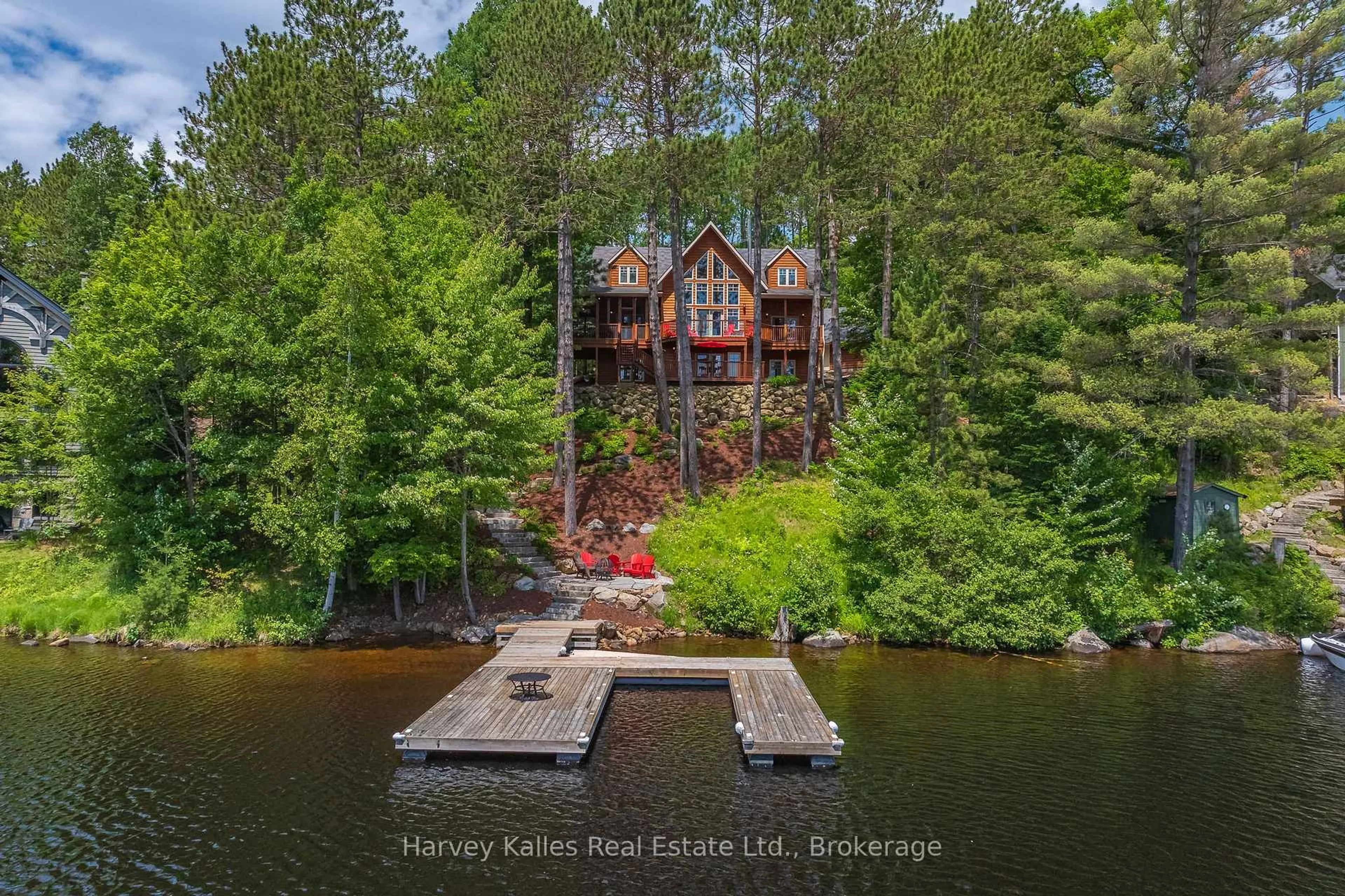 A pic from outside/outdoor area/front of a property/back of a property/a pic from drone, water/lake/river/ocean view for 147 Gall Tr, Huntsville Ontario P0B 1M0