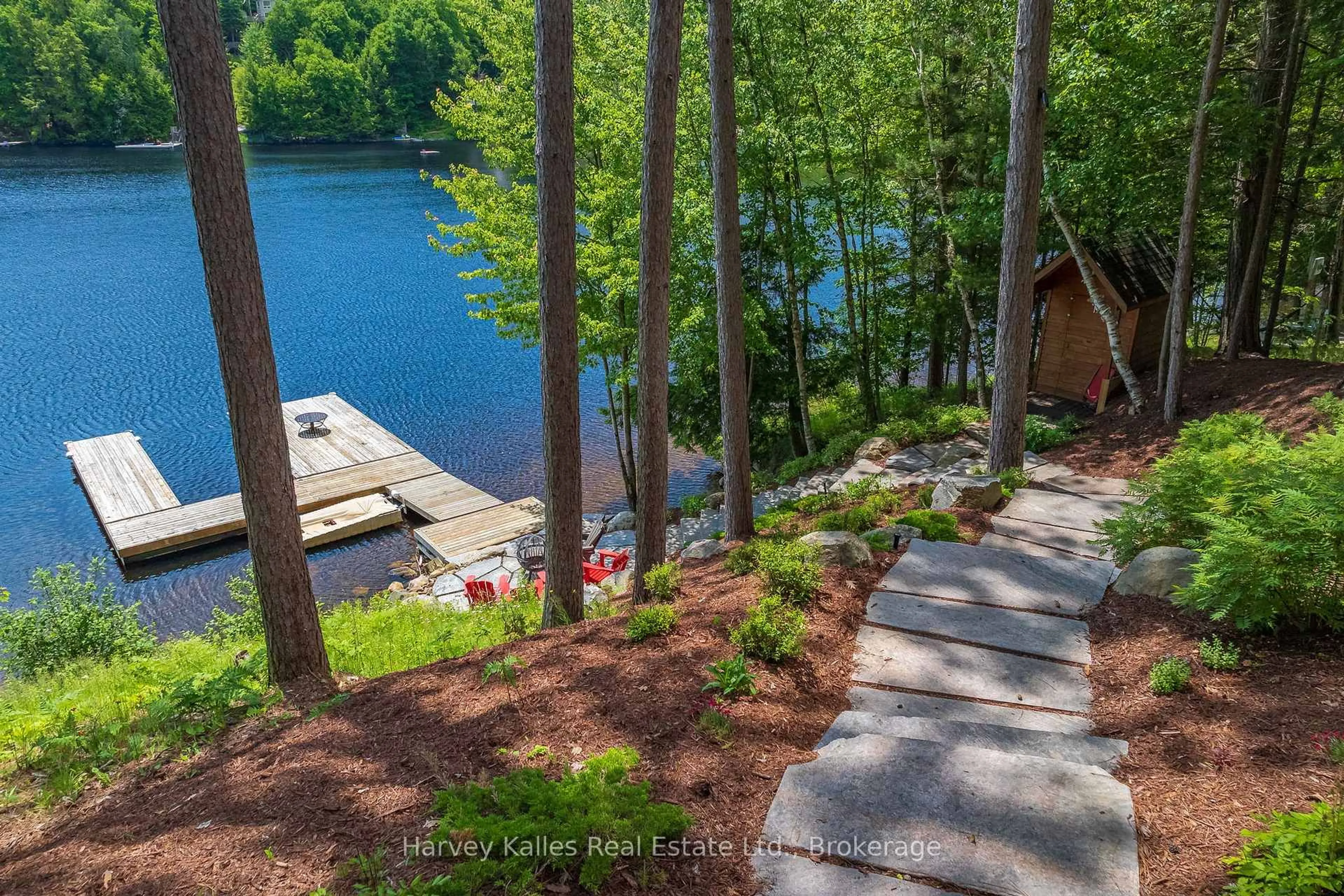 A pic from outside/outdoor area/front of a property/back of a property/a pic from drone, water/lake/river/ocean view for 147 Gall Tr, Huntsville Ontario P0B 1M0