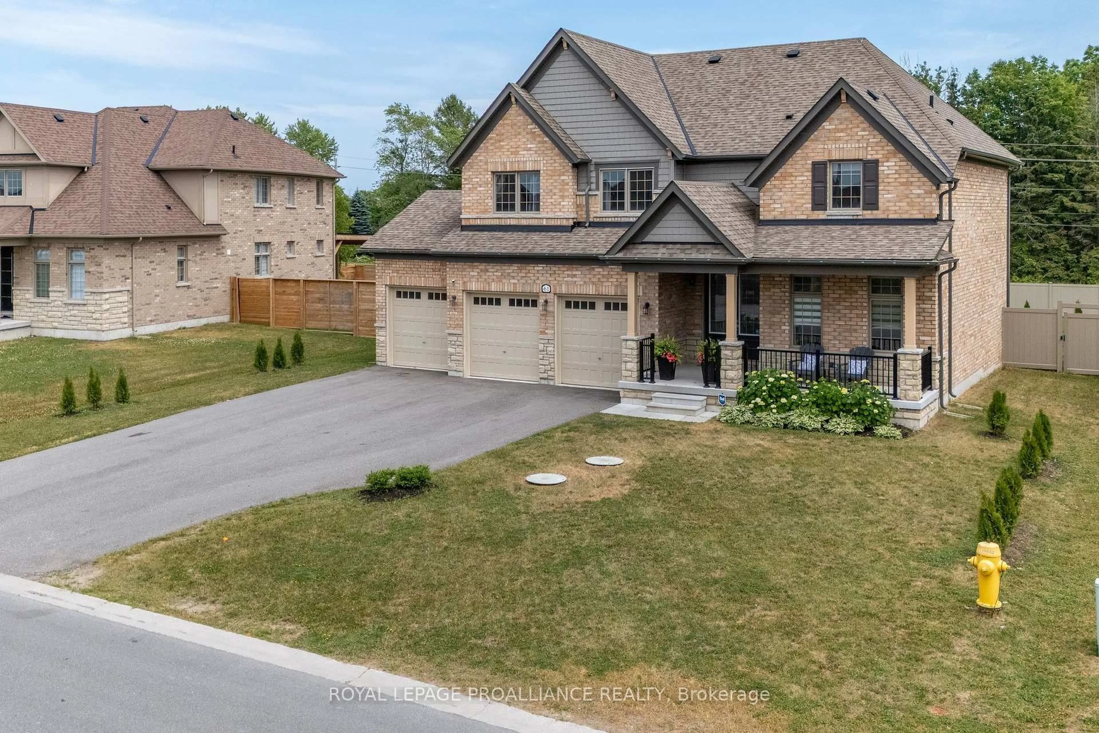 A pic from outside/outdoor area/front of a property/back of a property/a pic from drone, street for 61 Summer Breeze Dr, Prince Edward County Ontario K0K 1L0