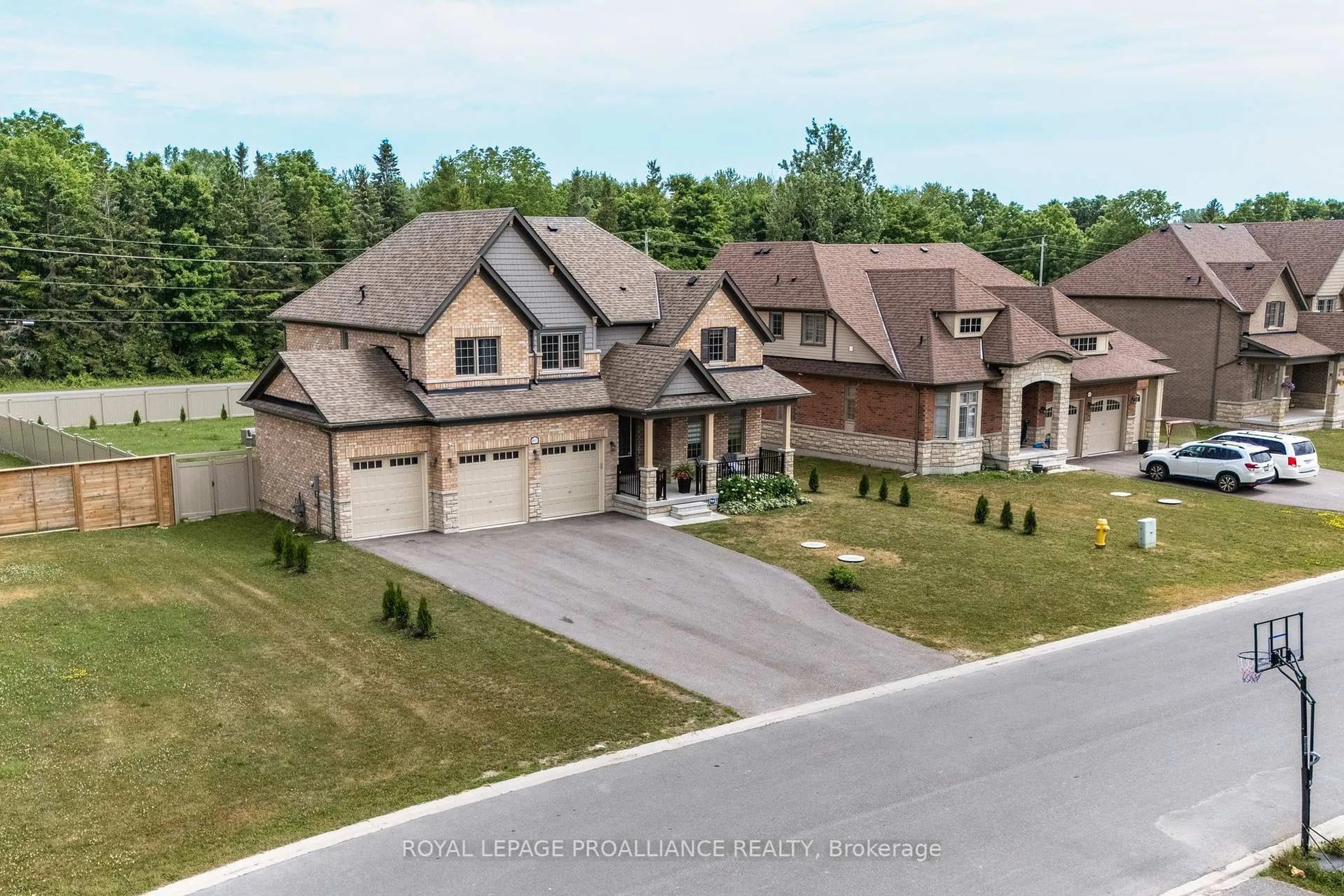 A pic from outside/outdoor area/front of a property/back of a property/a pic from drone, street for 61 Summer Breeze Dr, Prince Edward County Ontario K0K 1L0