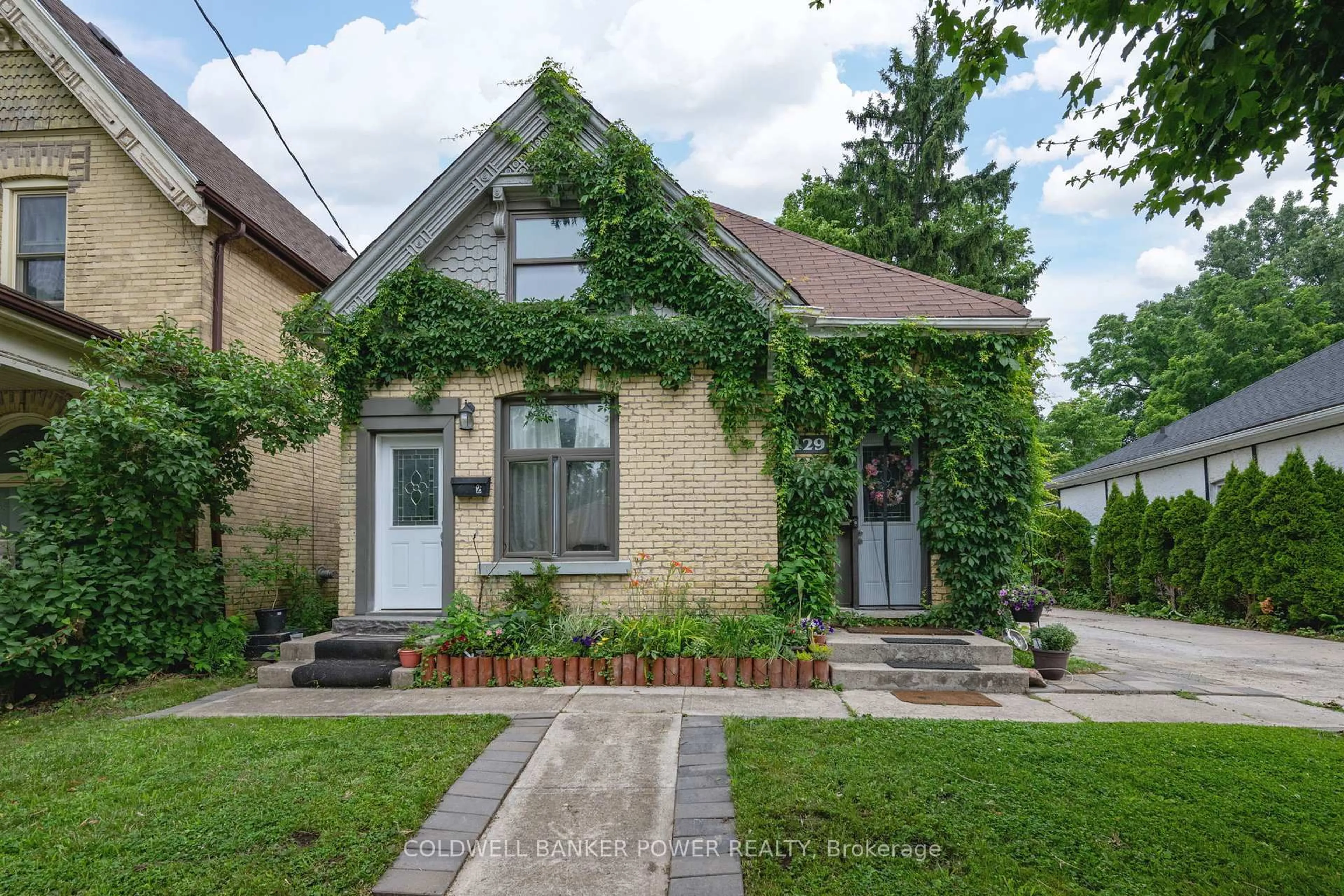 Home with brick exterior material, street for 129 Mount Pleasant Ave, London North Ontario N6H 1E1