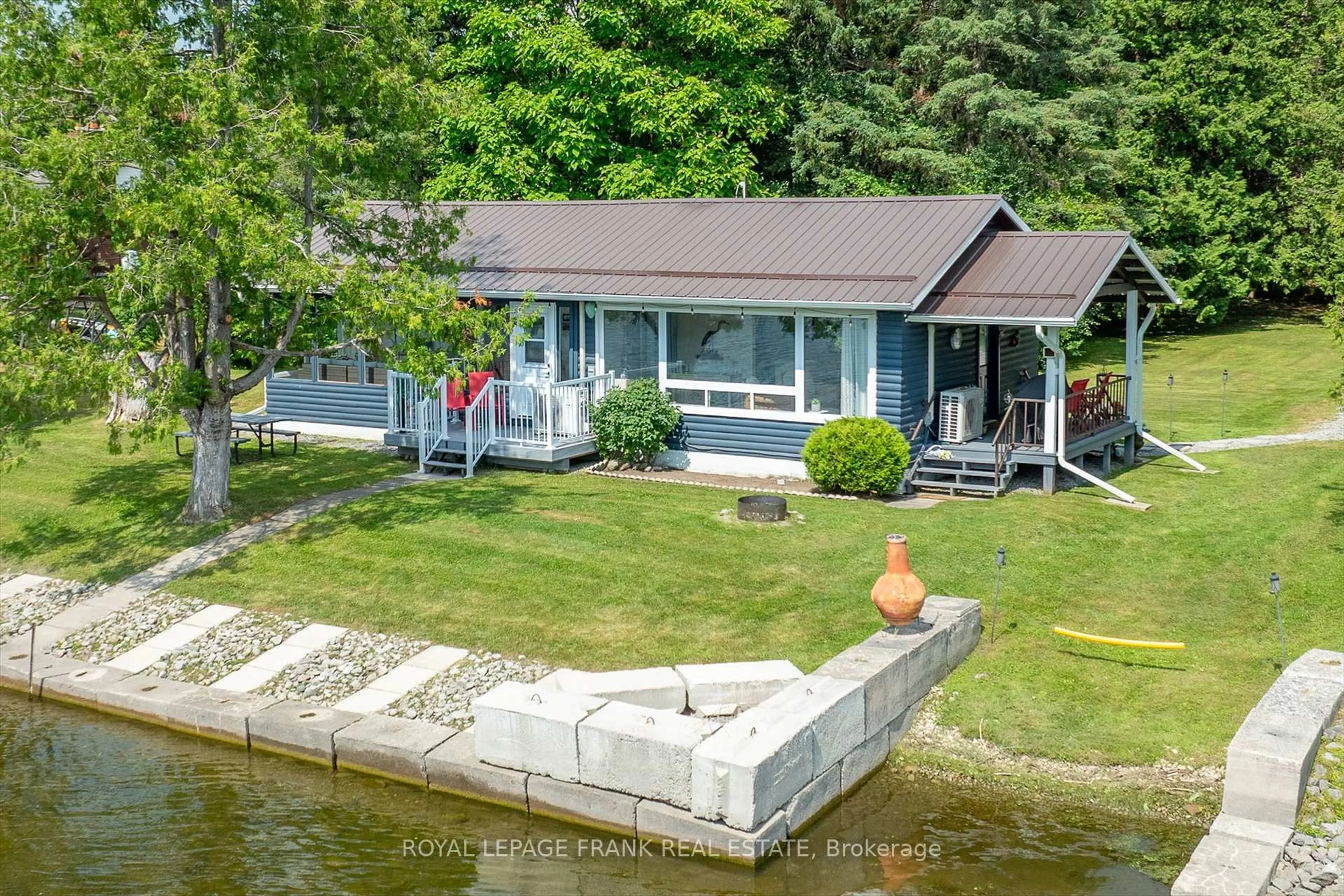 A pic from outside/outdoor area/front of a property/back of a property/a pic from drone, water/lake/river/ocean view for 410 Cedar Bank Rd, Otonabee-South Monaghan Ontario K9J 6Y3