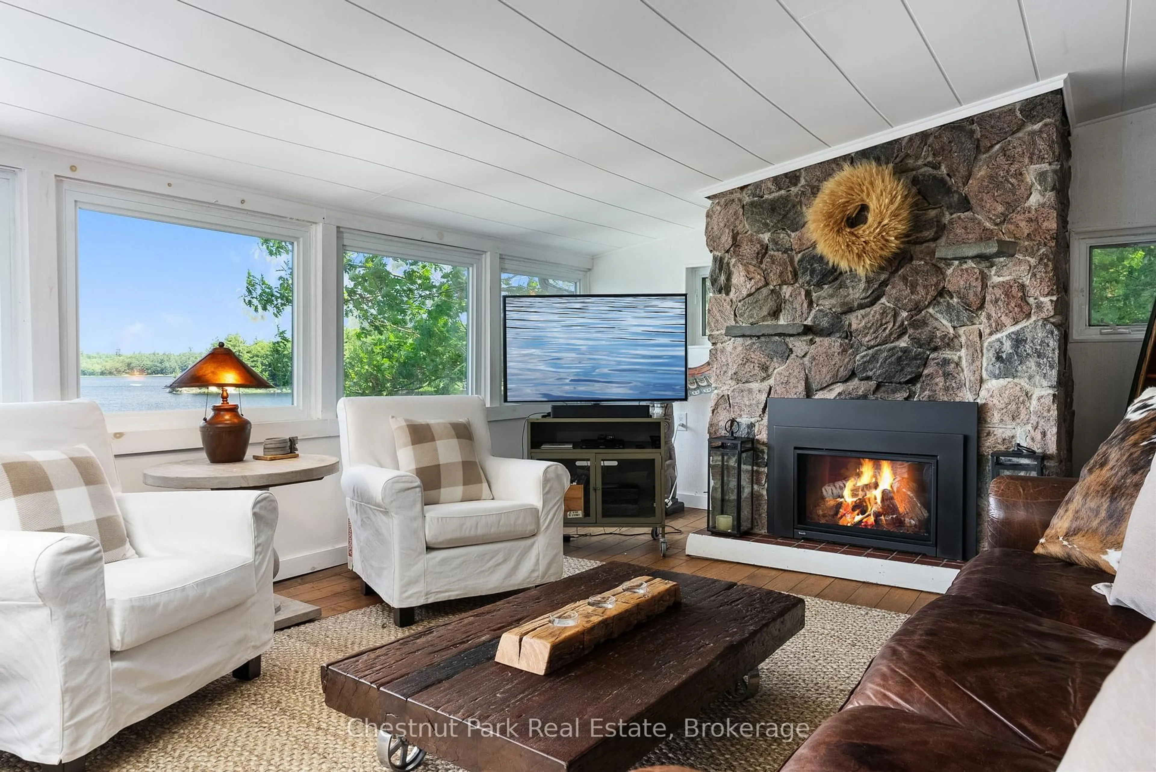 Living room with furniture, unknown for 2838 Muskoka Road 118W ##2, Muskoka Lakes Ontario P0B 1J0