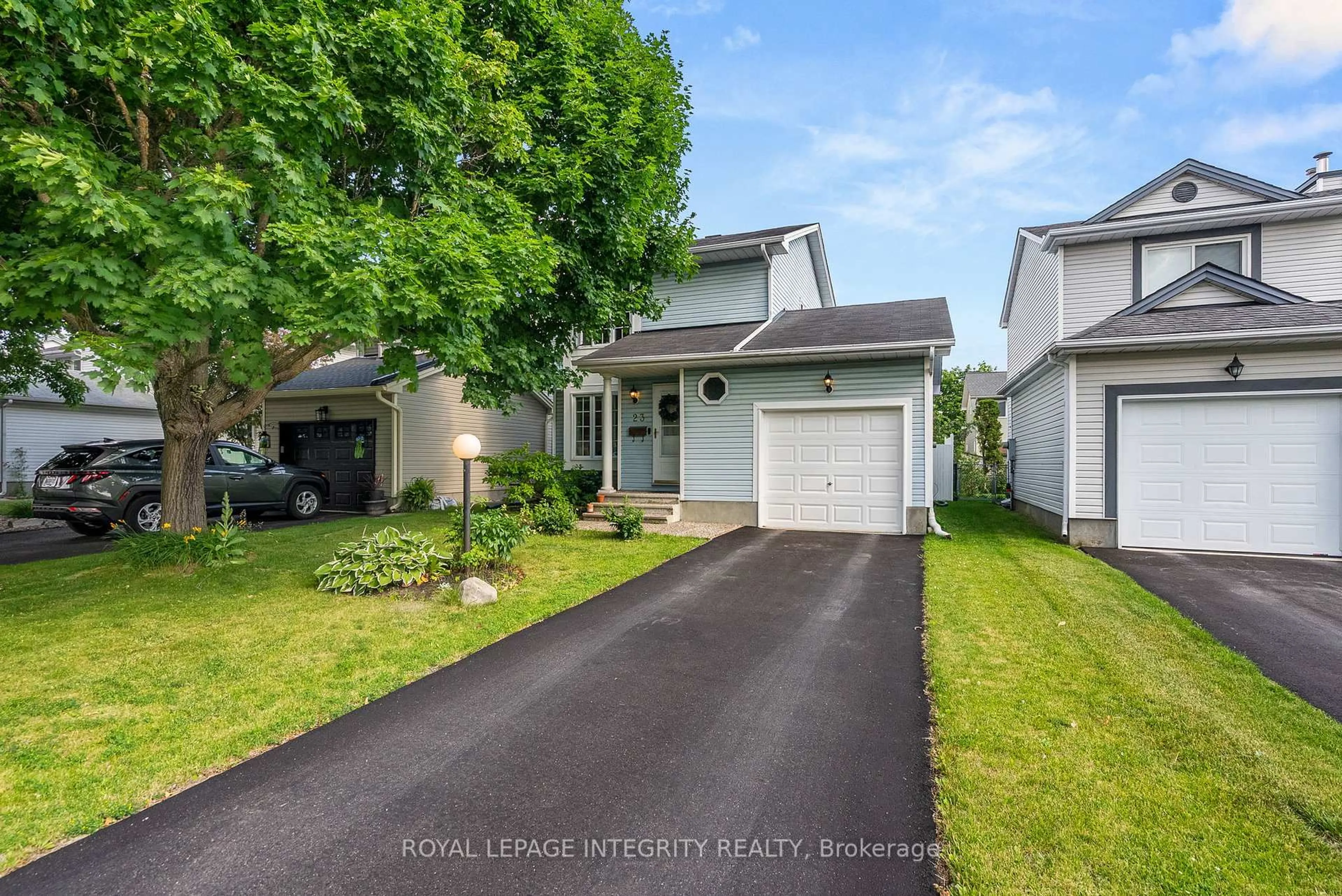 Home with vinyl exterior material, street for 23 Peacock Cres, Ottawa Ontario K2J 3P1
