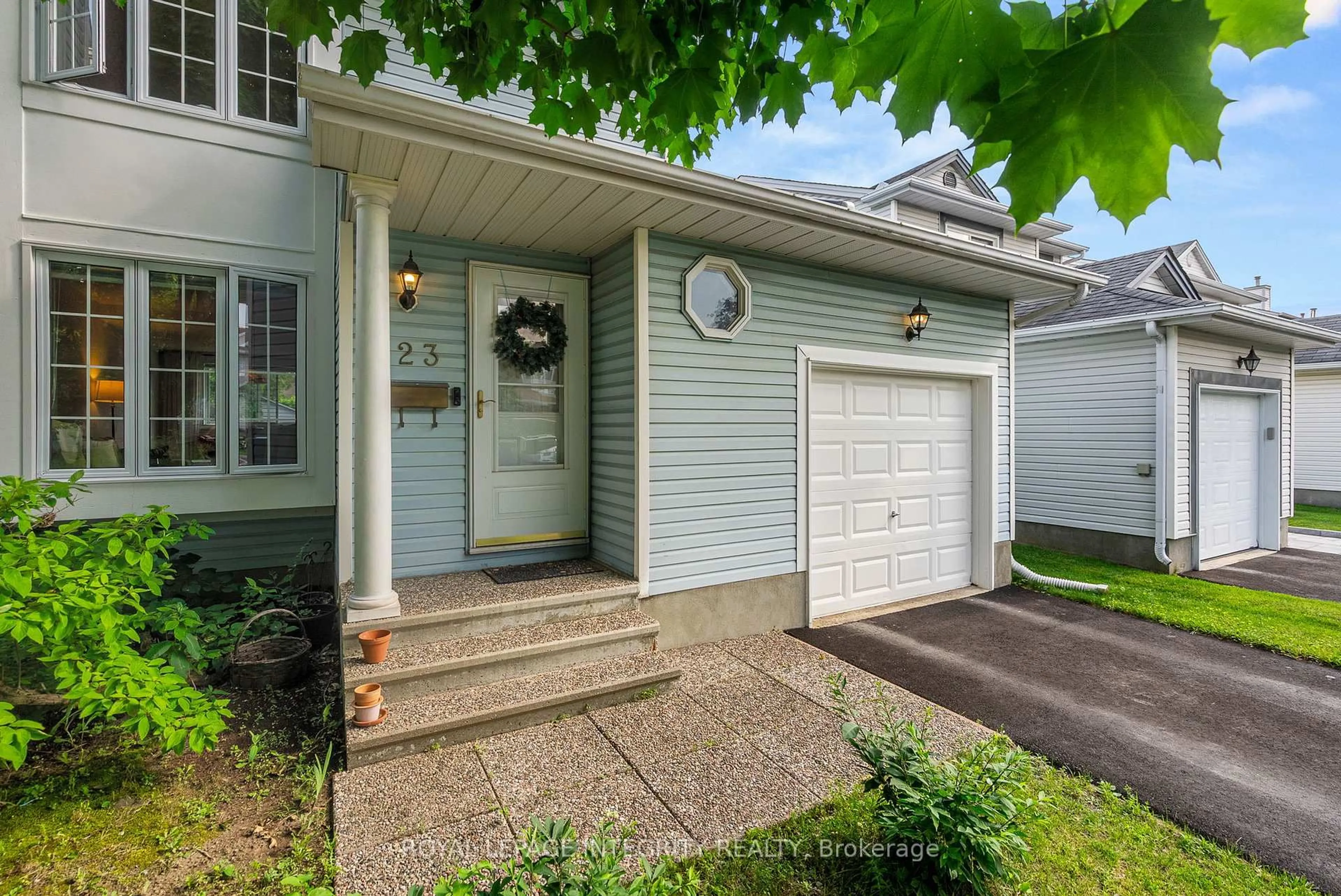 Home with vinyl exterior material, street for 23 Peacock Cres, Ottawa Ontario K2J 3P1
