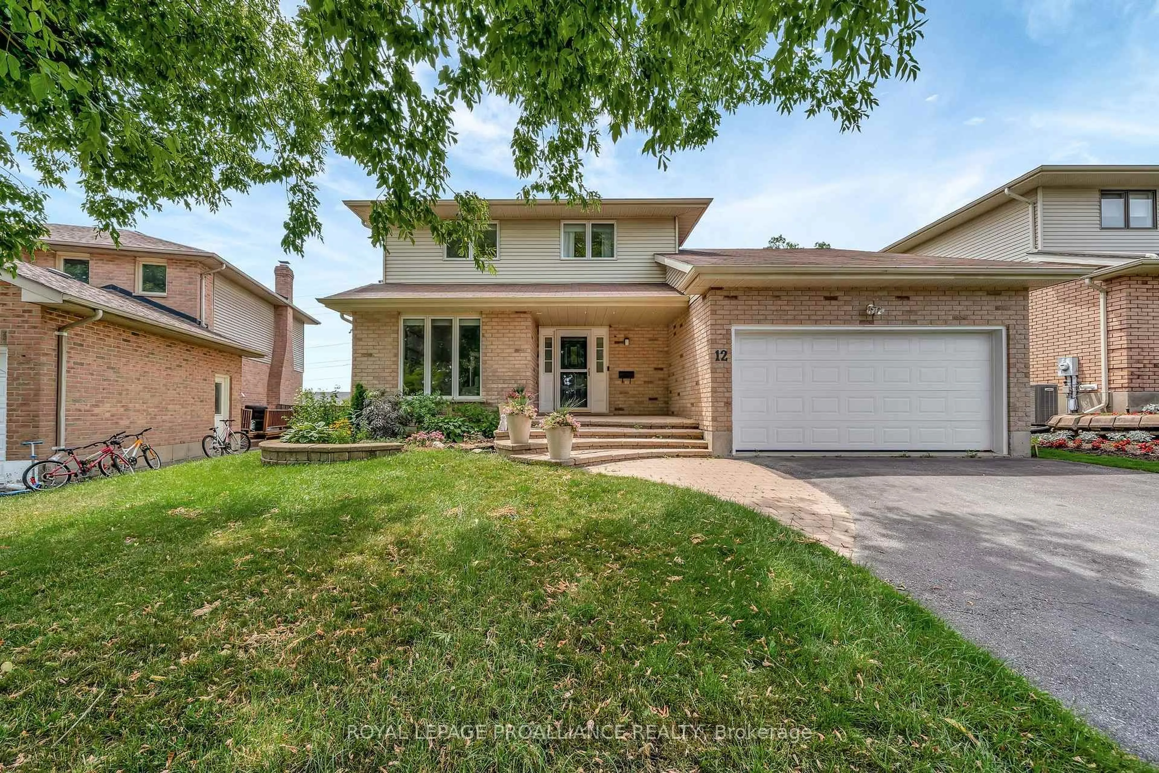 Home with brick exterior material, street for 12 Hastings Dr, Quinte West Ontario K8V 6L3