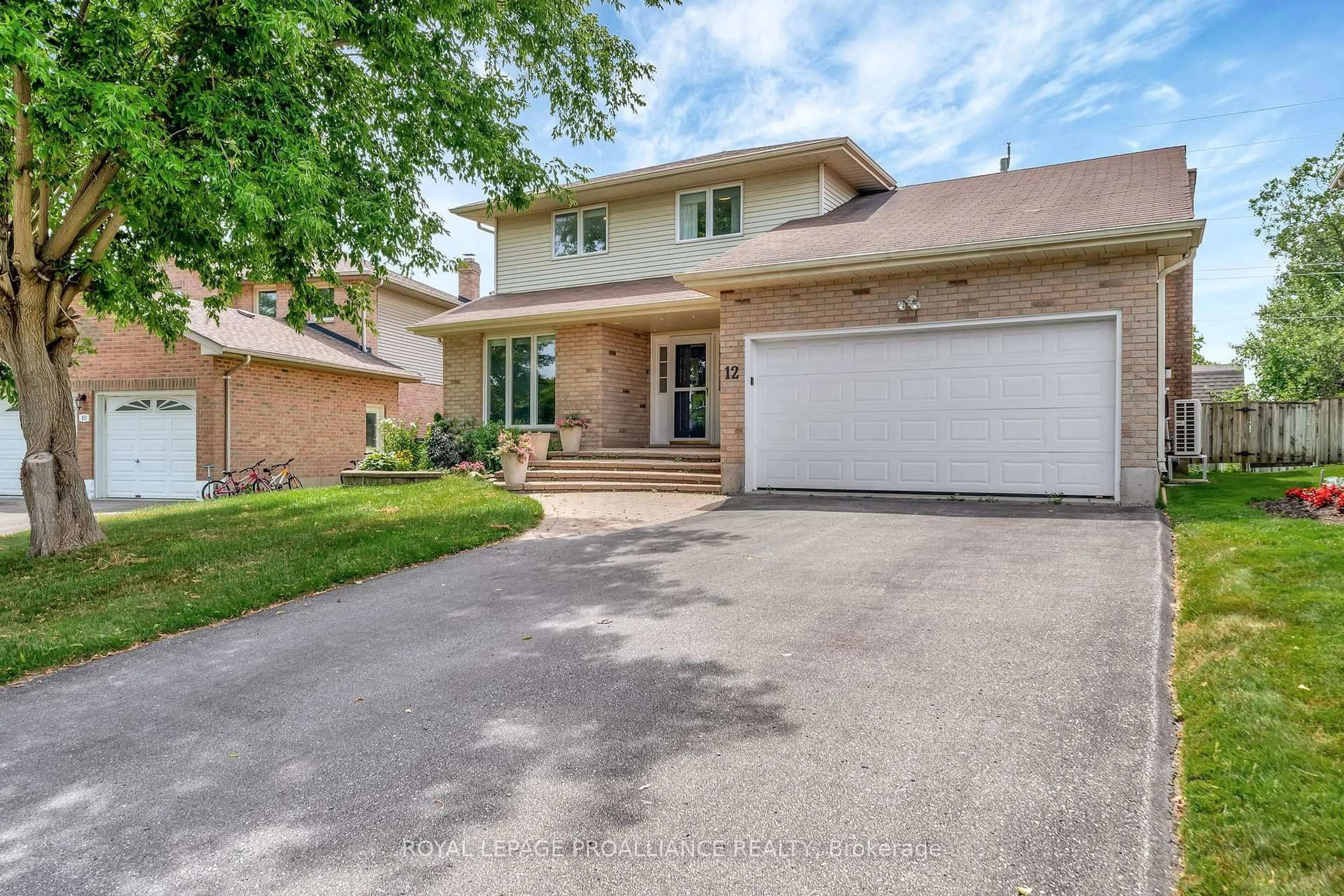 Home with brick exterior material, street for 12 Hastings Dr, Quinte West Ontario K8V 6L3