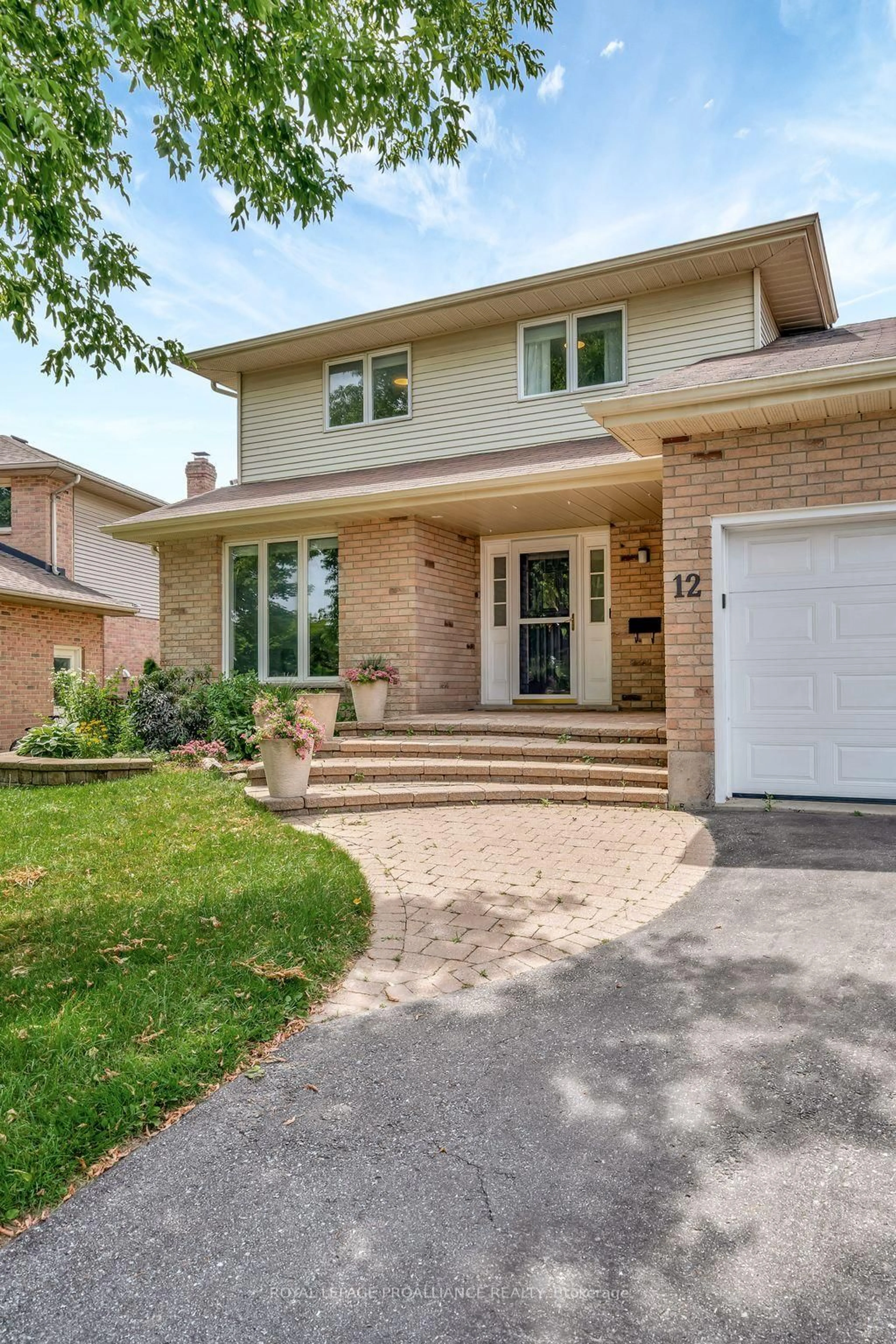 Home with brick exterior material, street for 12 Hastings Dr, Quinte West Ontario K8V 6L3