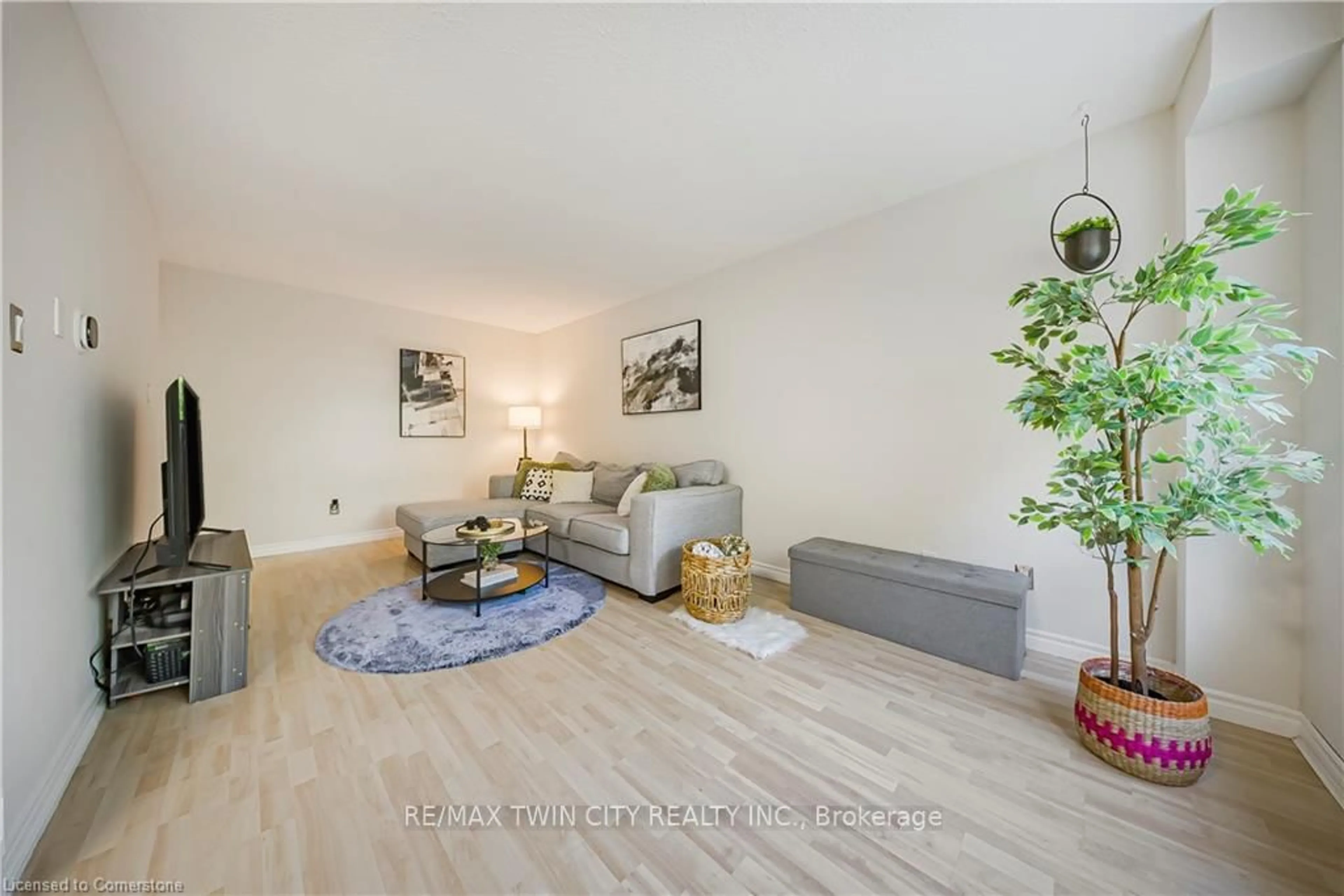 Living room with furniture, unknown for 391 Pioneer Dr #3, Kitchener Ontario N2P 1L8