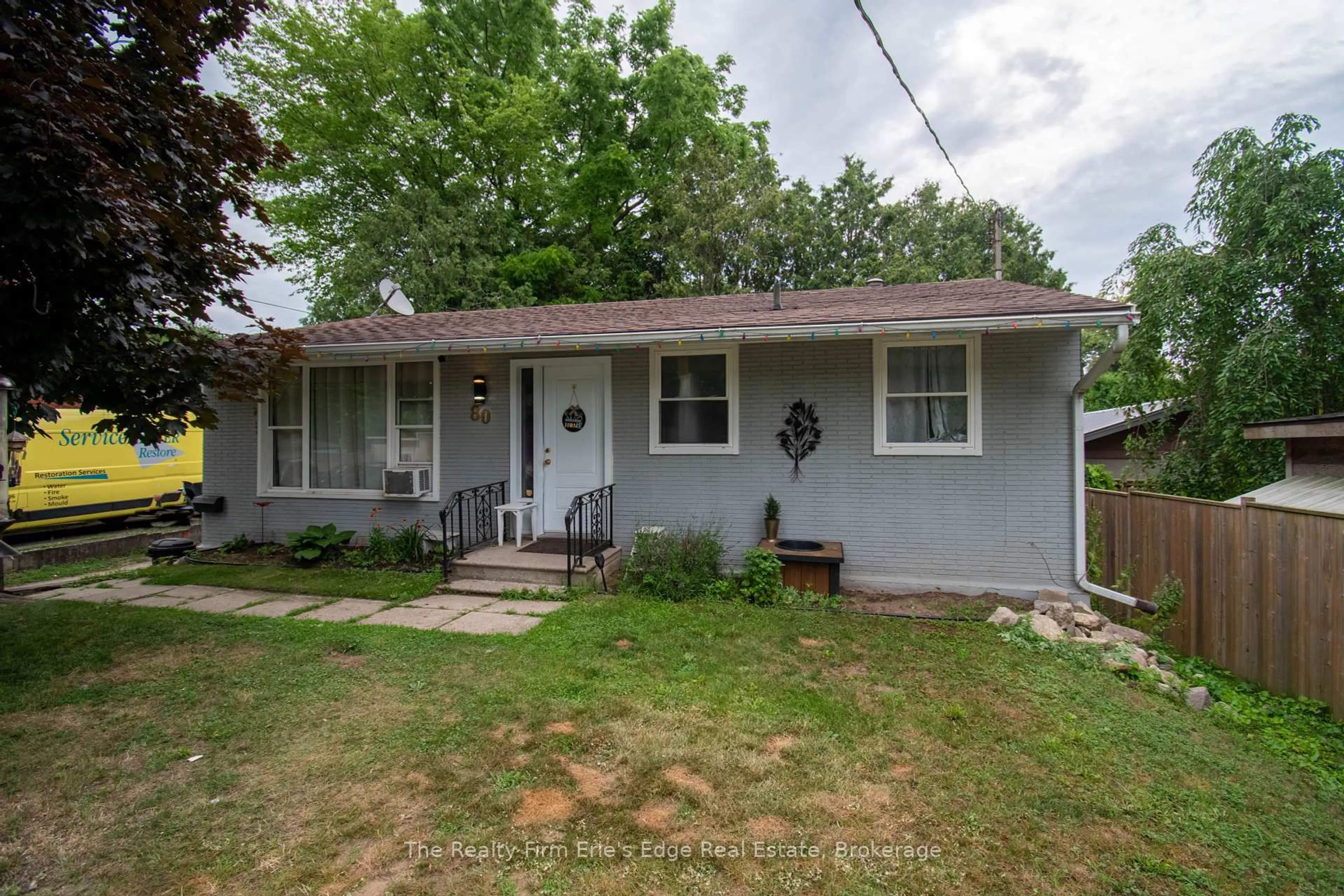 Home with vinyl exterior material, street for 80 Frank St, Tillsonburg Ontario N4G 3M5