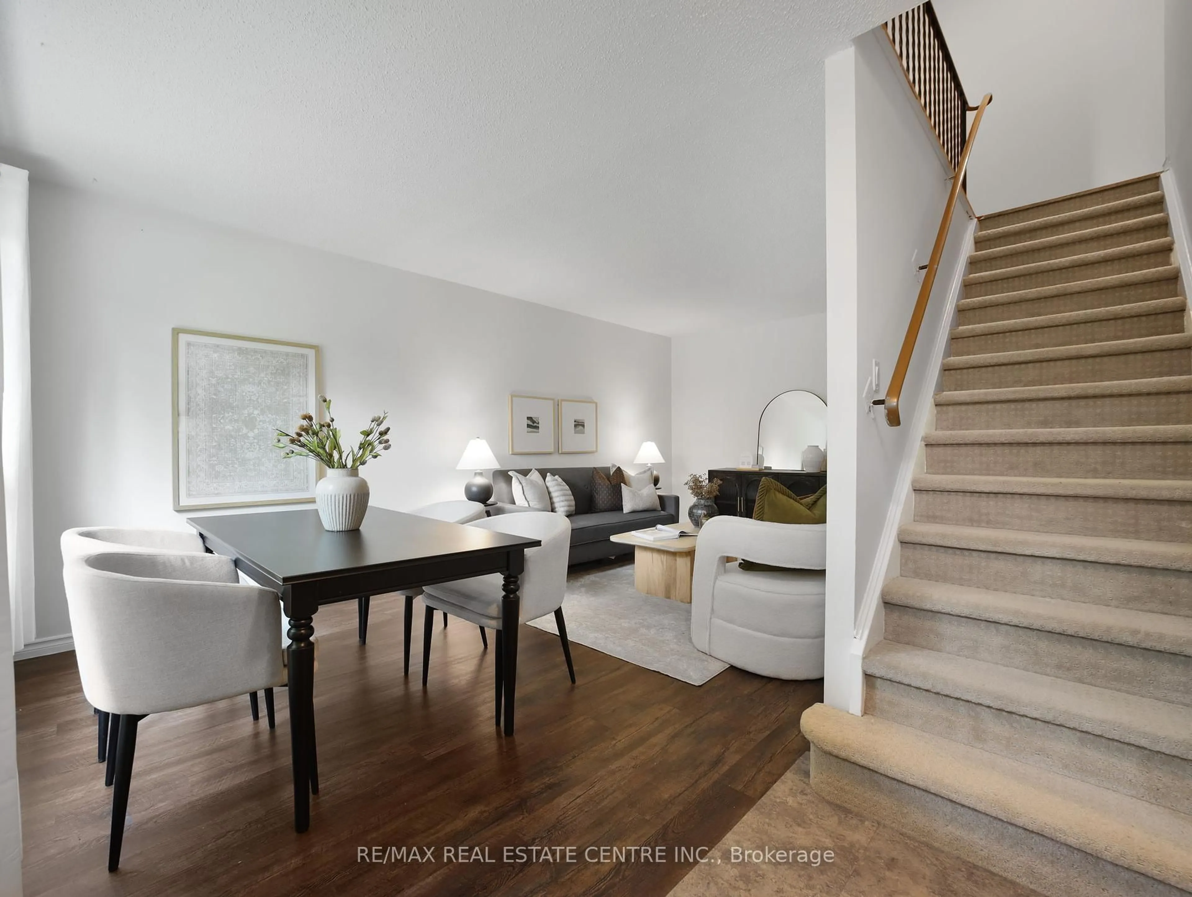 Living room with furniture, wood/laminate floor for 453 Albert St #9, Waterloo Ontario N2L 5A7