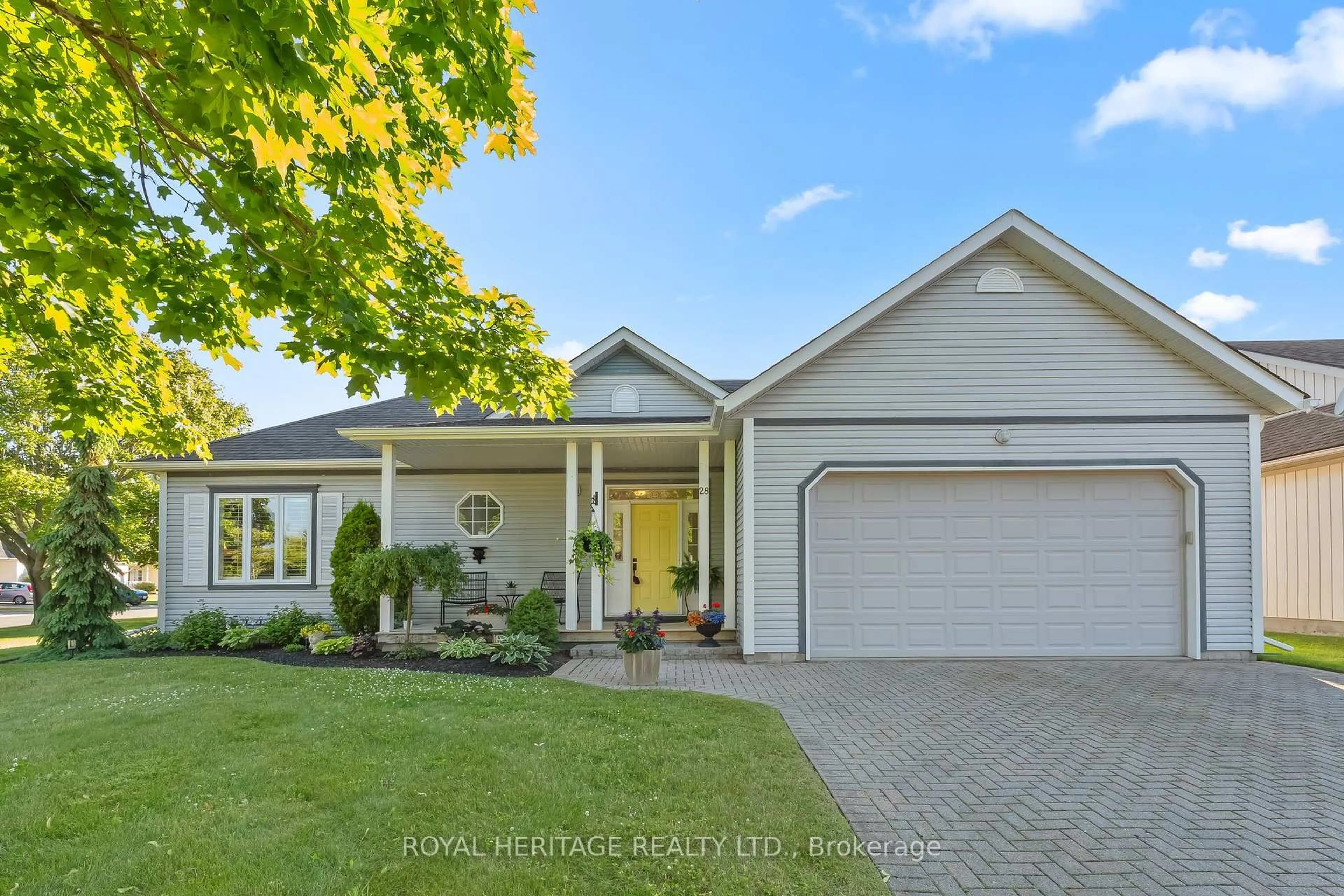 Home with vinyl exterior material, street for 28 Mills Rd, Brighton Ontario K0K 1H0