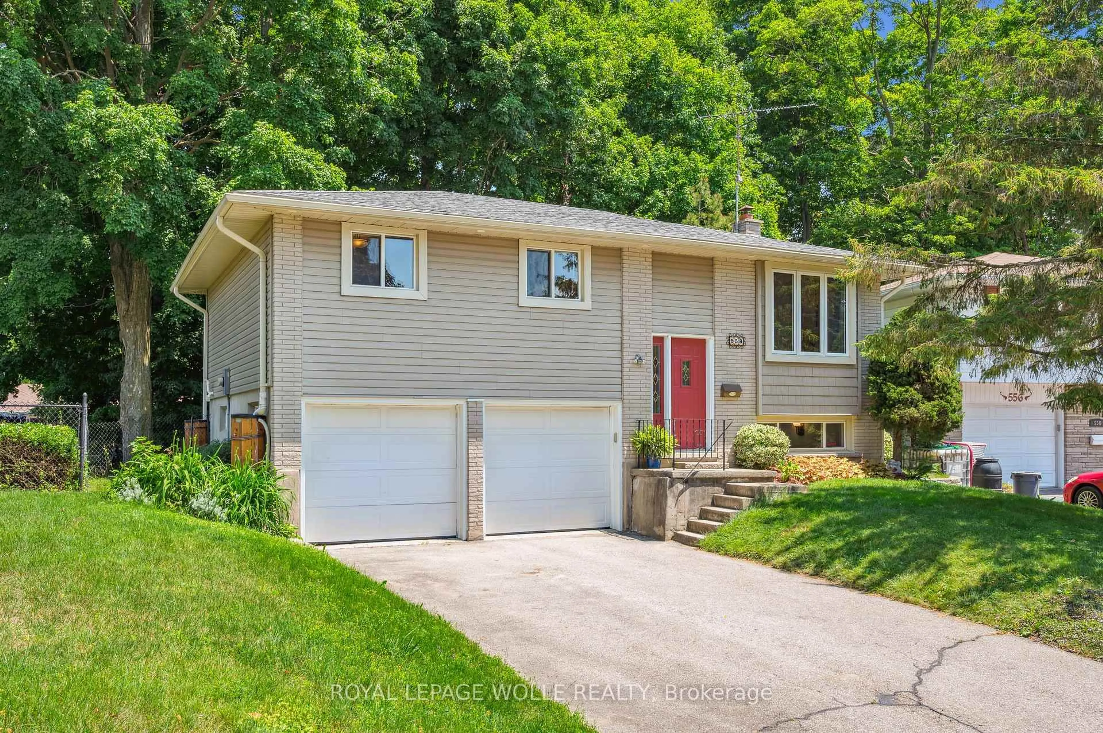 Home with vinyl exterior material, street for 558 Elm Ridge Pl, Waterloo Ontario N2L 4P7