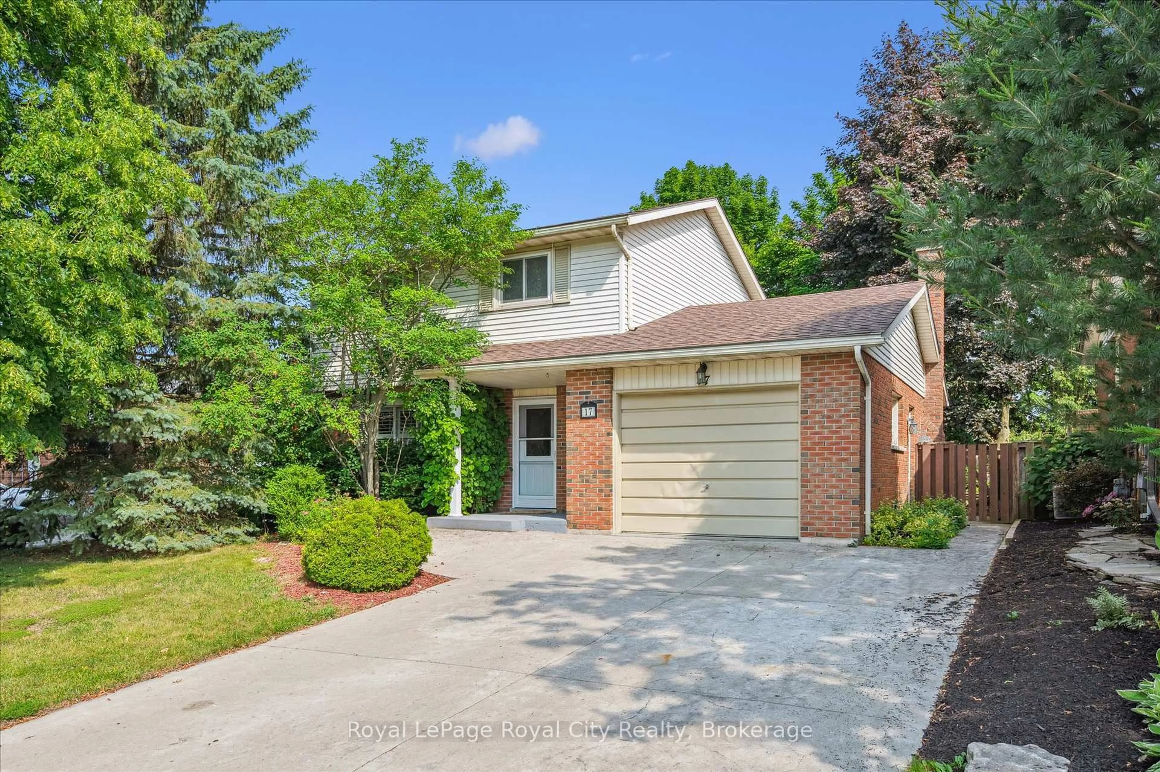 Home with brick exterior material, street for 17 Springdale Blvd, Guelph Ontario N1H 6X4