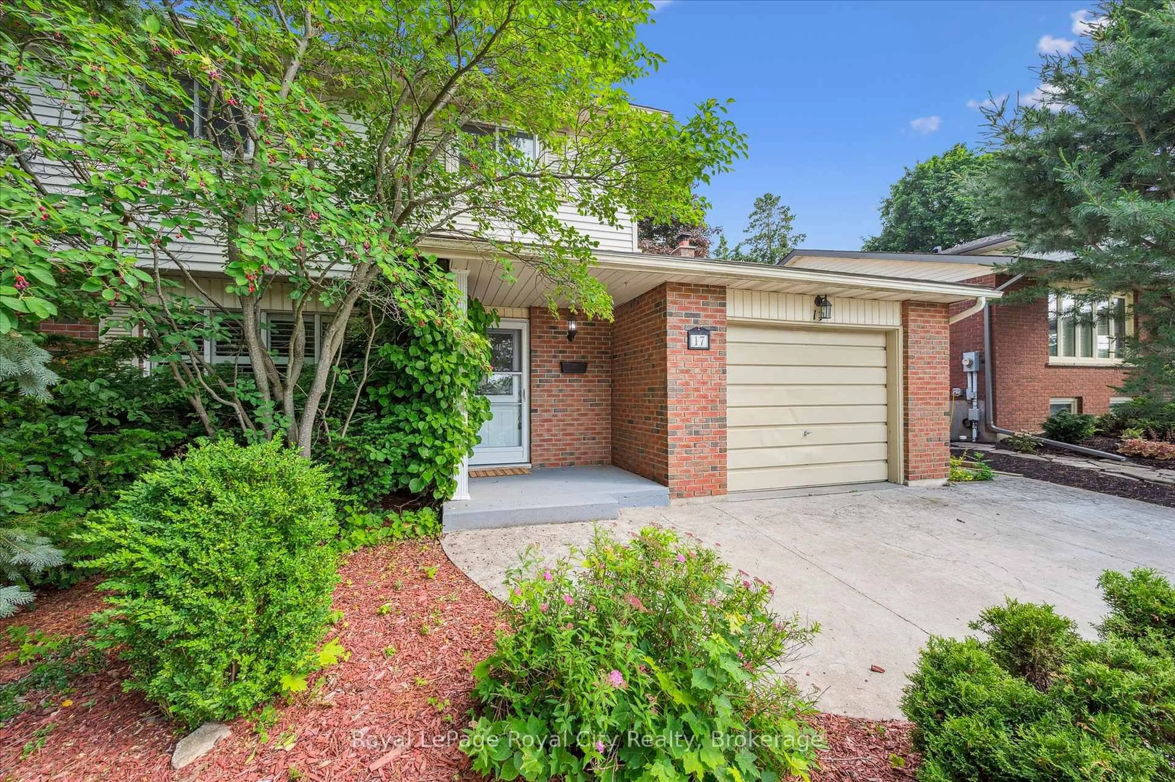 Home with brick exterior material, street for 17 Springdale Blvd, Guelph Ontario N1H 6X4