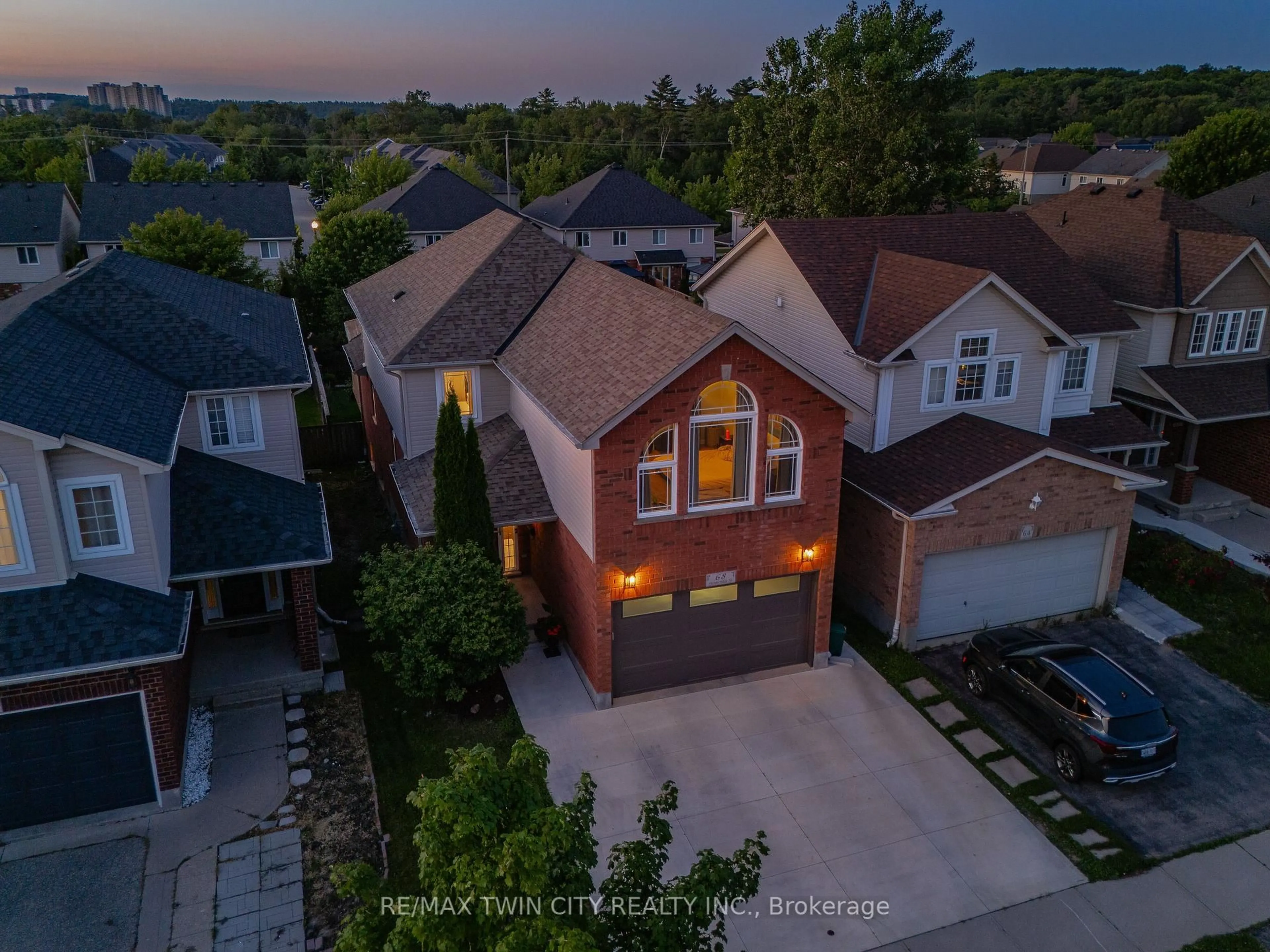 A pic from outside/outdoor area/front of a property/back of a property/a pic from drone, street for 68 Steepleridge St, Kitchener Ontario N2P 2W3