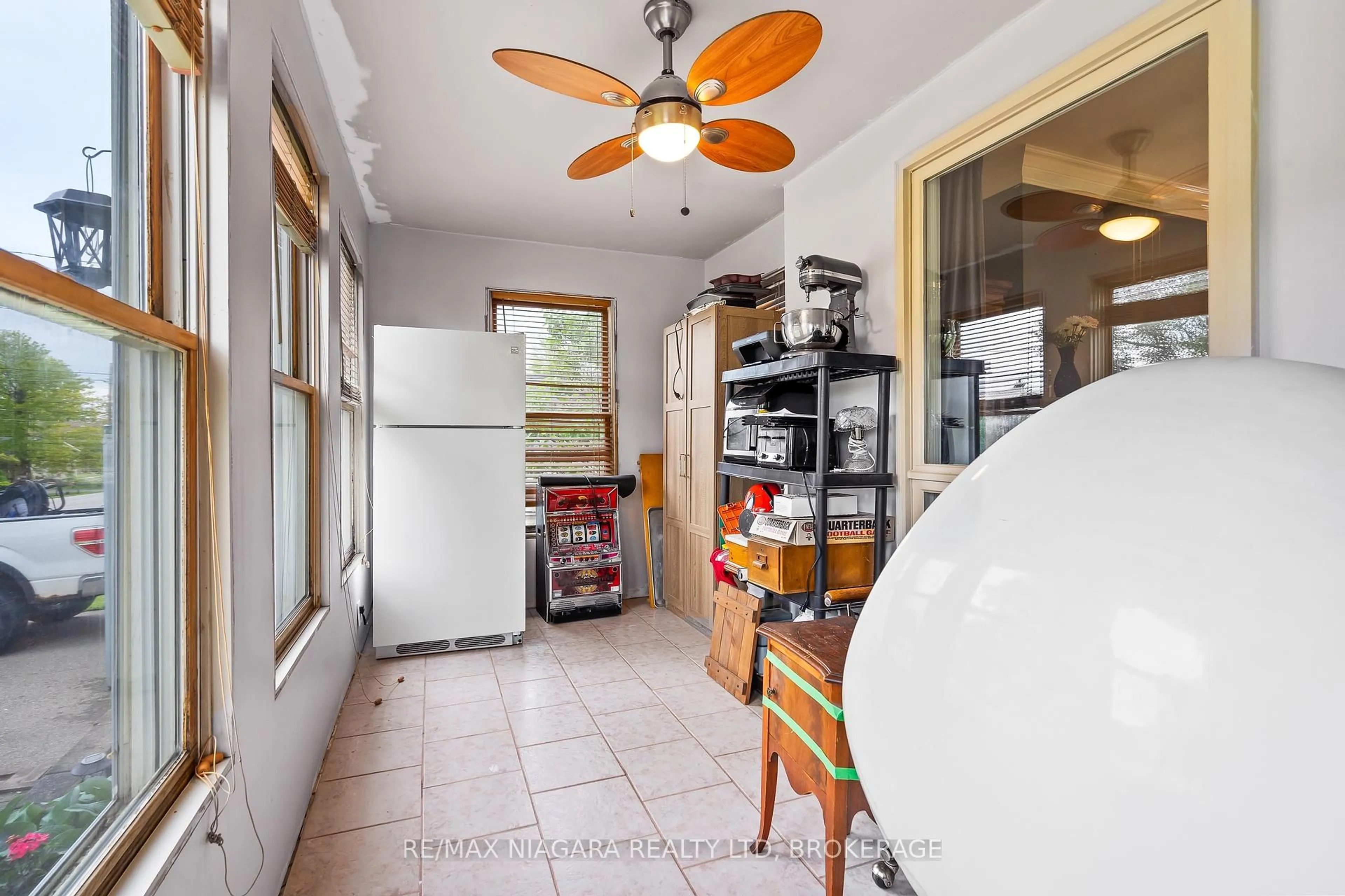 Kitchen with laundary machines, ceramic/tile floor for 71 Joseph St, Fort Erie Ontario L2A 5J6