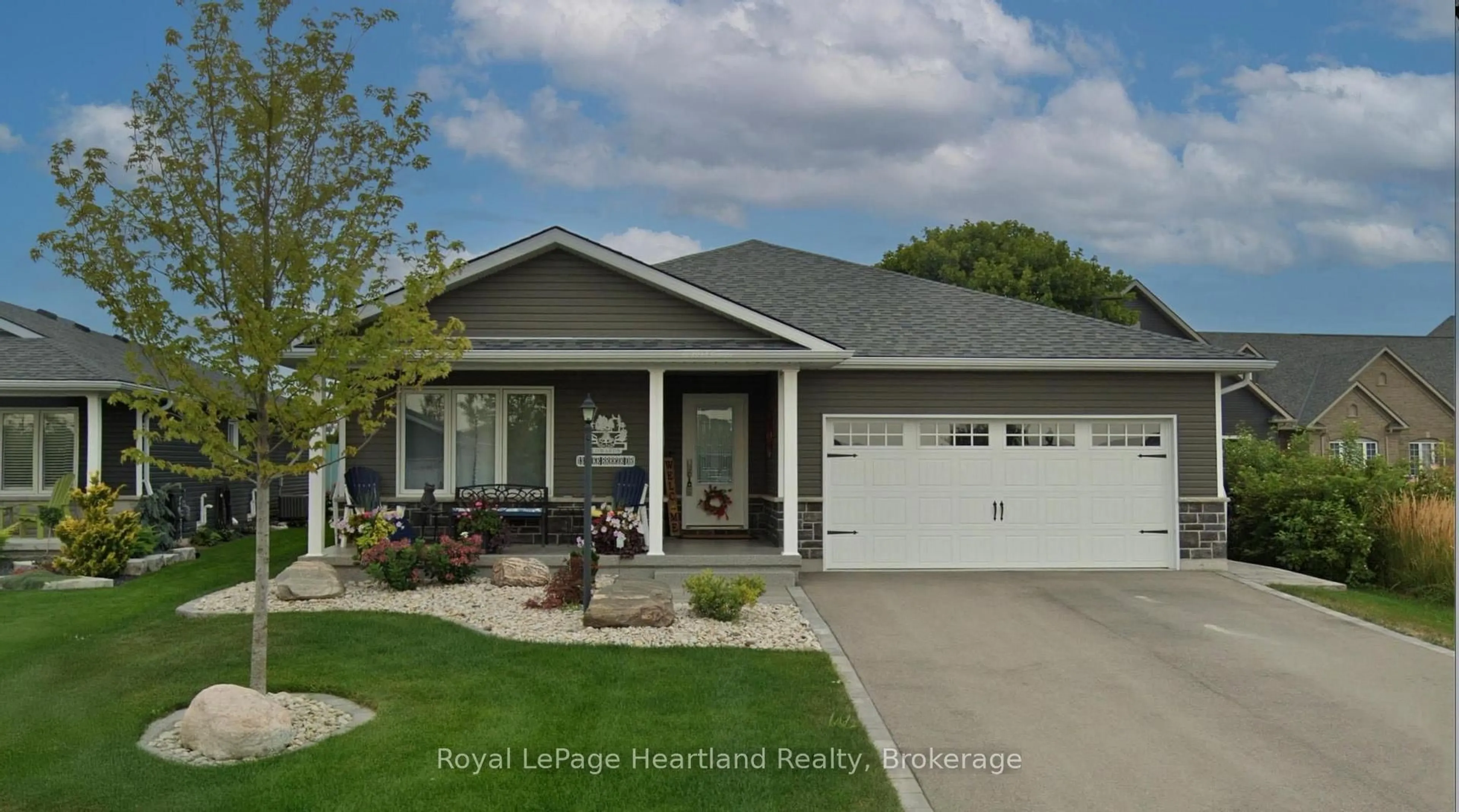 Home with vinyl exterior material, street for 13 Lakebreeze Dr, Ashfield-Colborne-Wawanosh Ontario N7A 0B1
