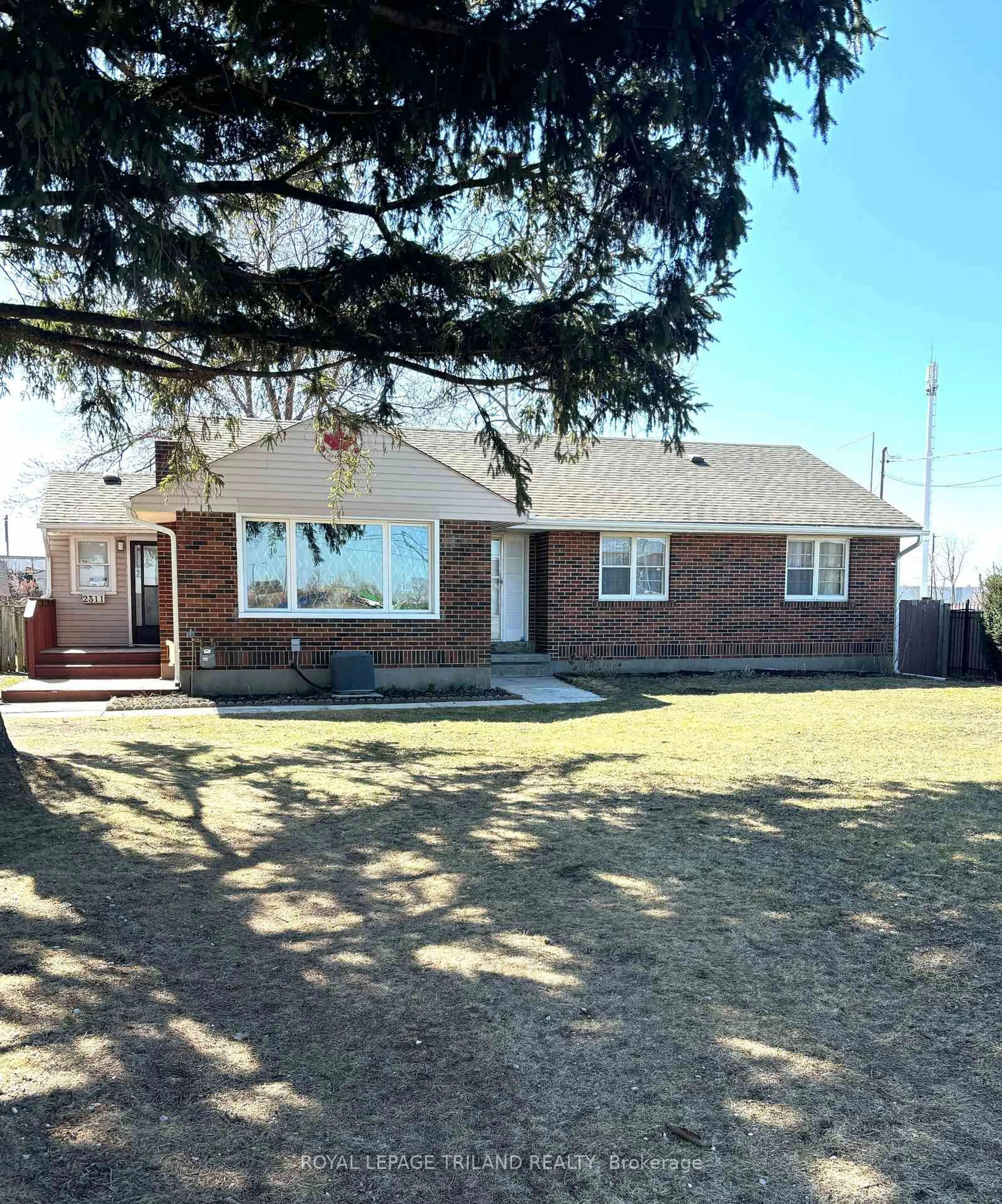 Home with brick exterior material, street for 2311 Dundas St, London East Ontario N5V 1R4