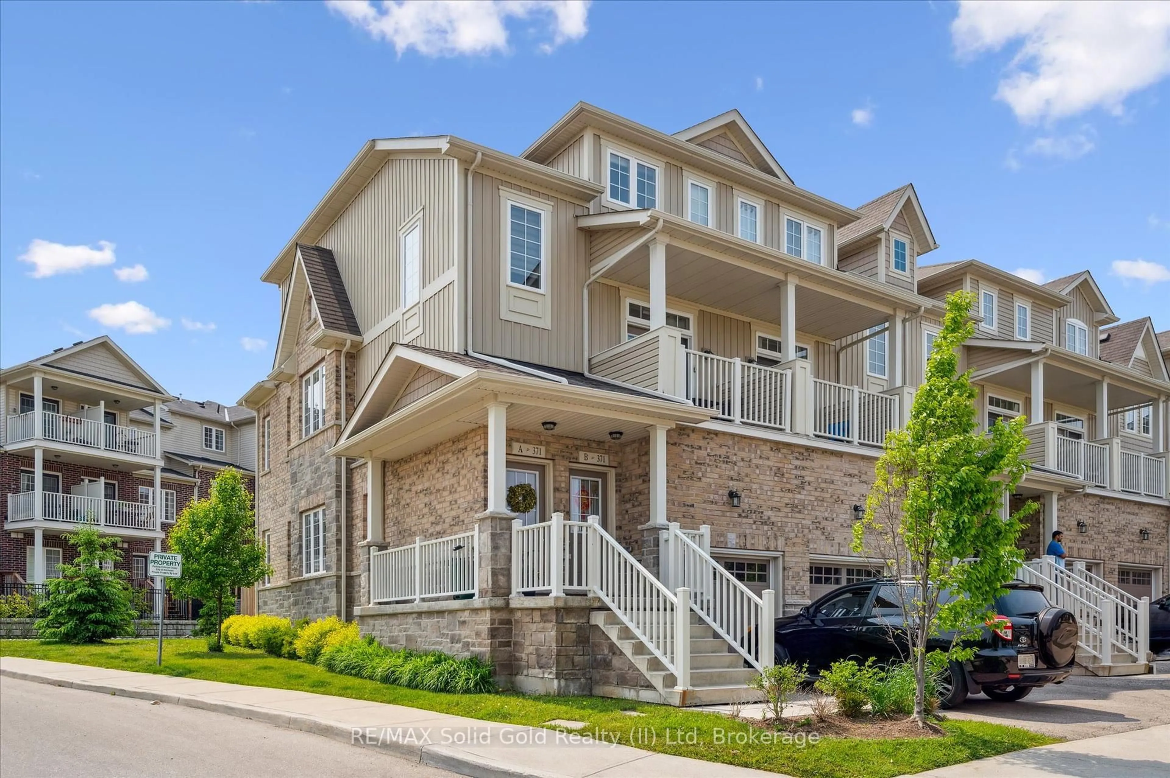 Home with brick exterior material, street for 371A WESTWOOD Dr, Kitchener Ontario N2M 0B5