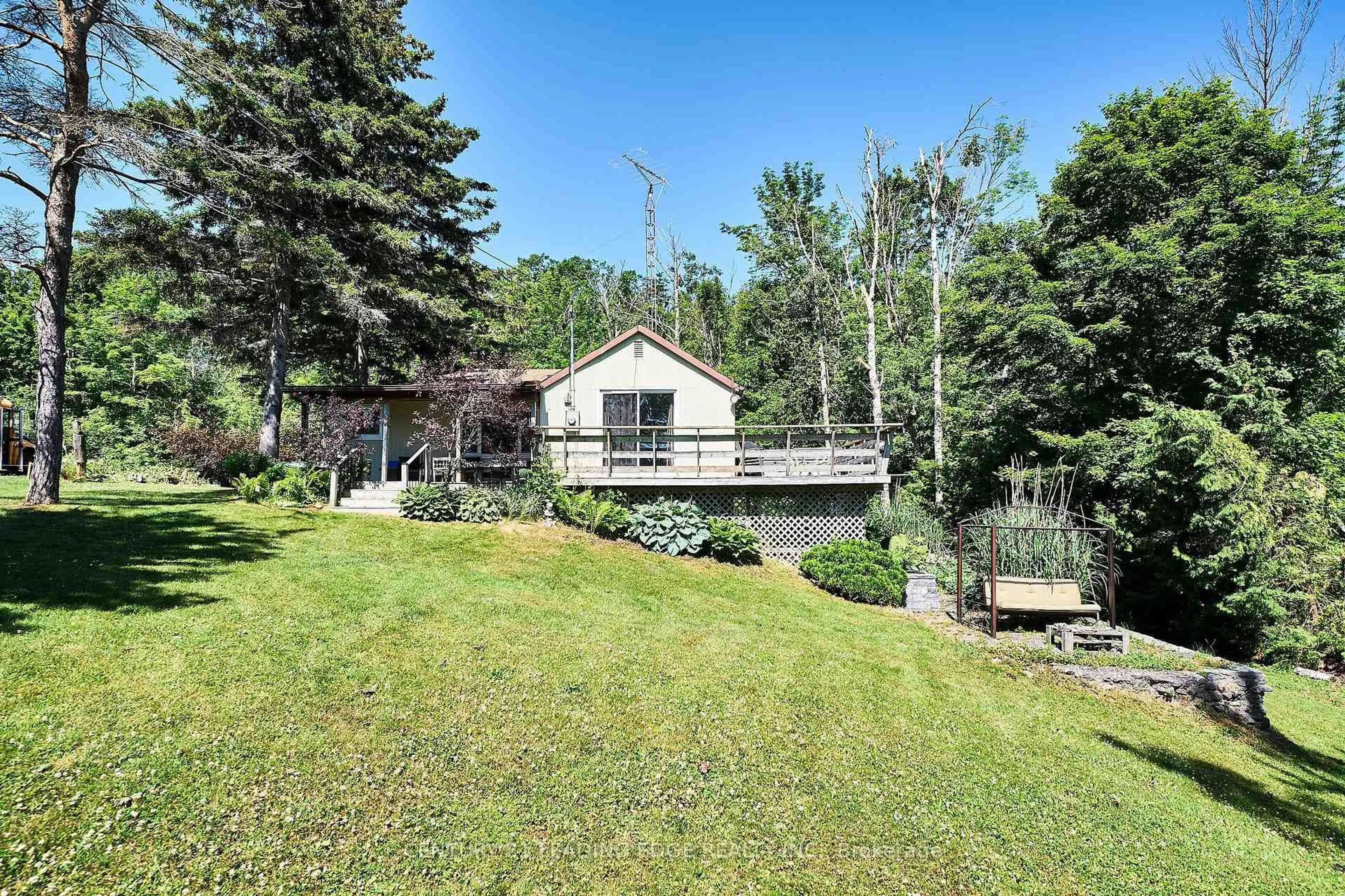 A pic from outside/outdoor area/front of a property/back of a property/a pic from drone, water/lake/river/ocean view for 225 Arnott Dr, Selwyn Ontario K0L 1T0