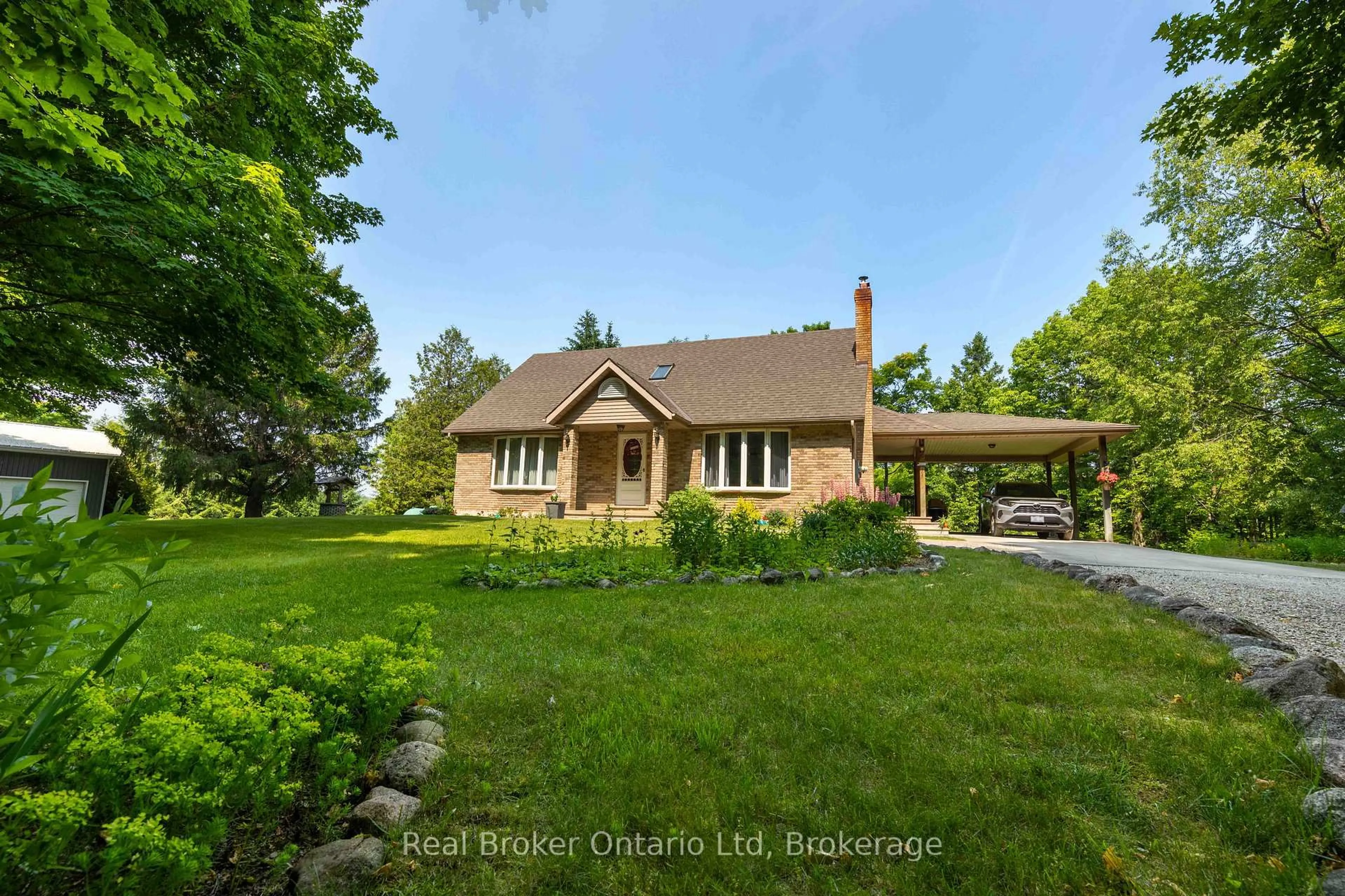 A pic from outside/outdoor area/front of a property/back of a property/a pic from drone, unknown for 203 Sideroad 5, South Bruce Peninsula Ontario N0H 1A0