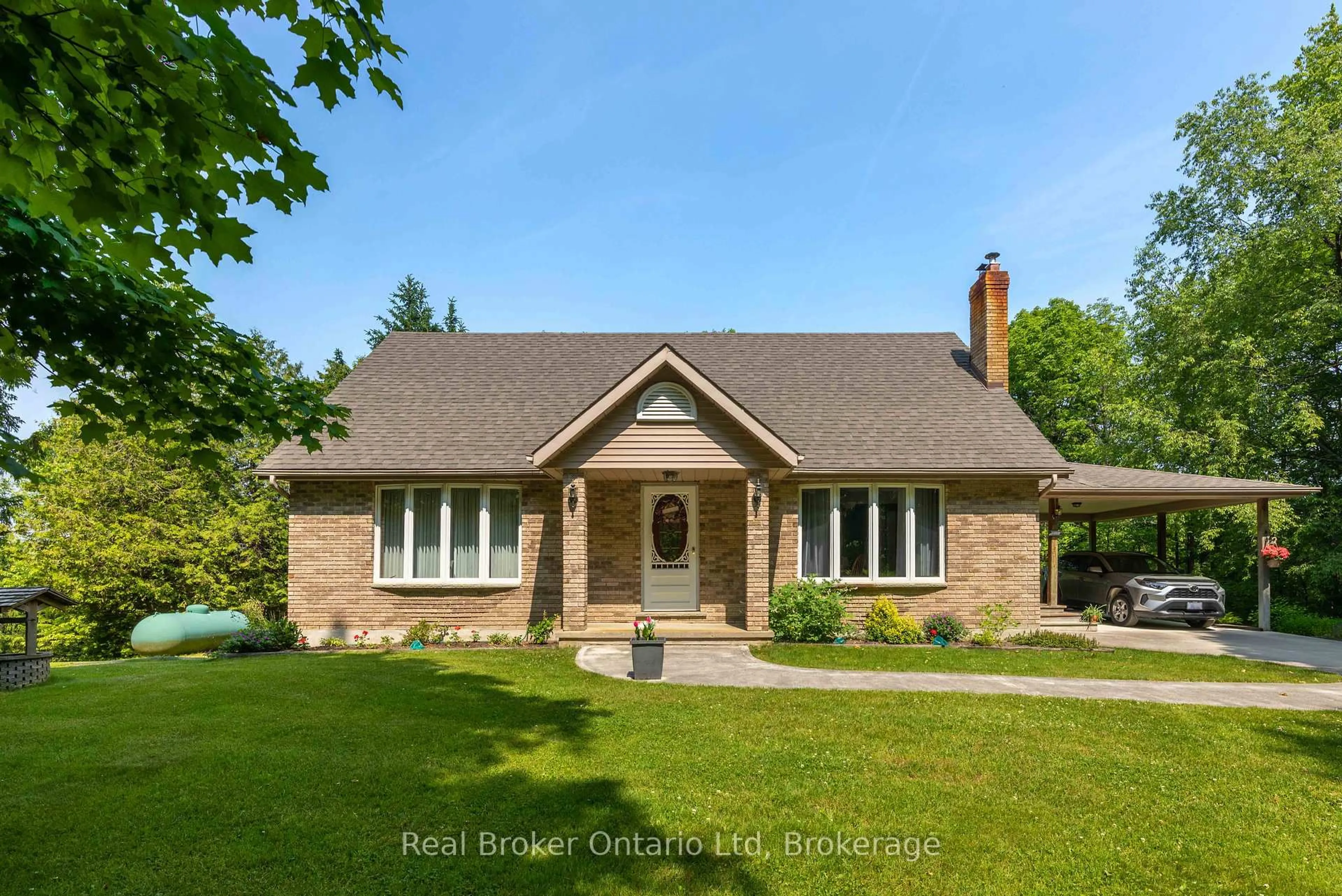 Home with brick exterior material, street for 203 Sideroad 5, South Bruce Peninsula Ontario N0H 1A0