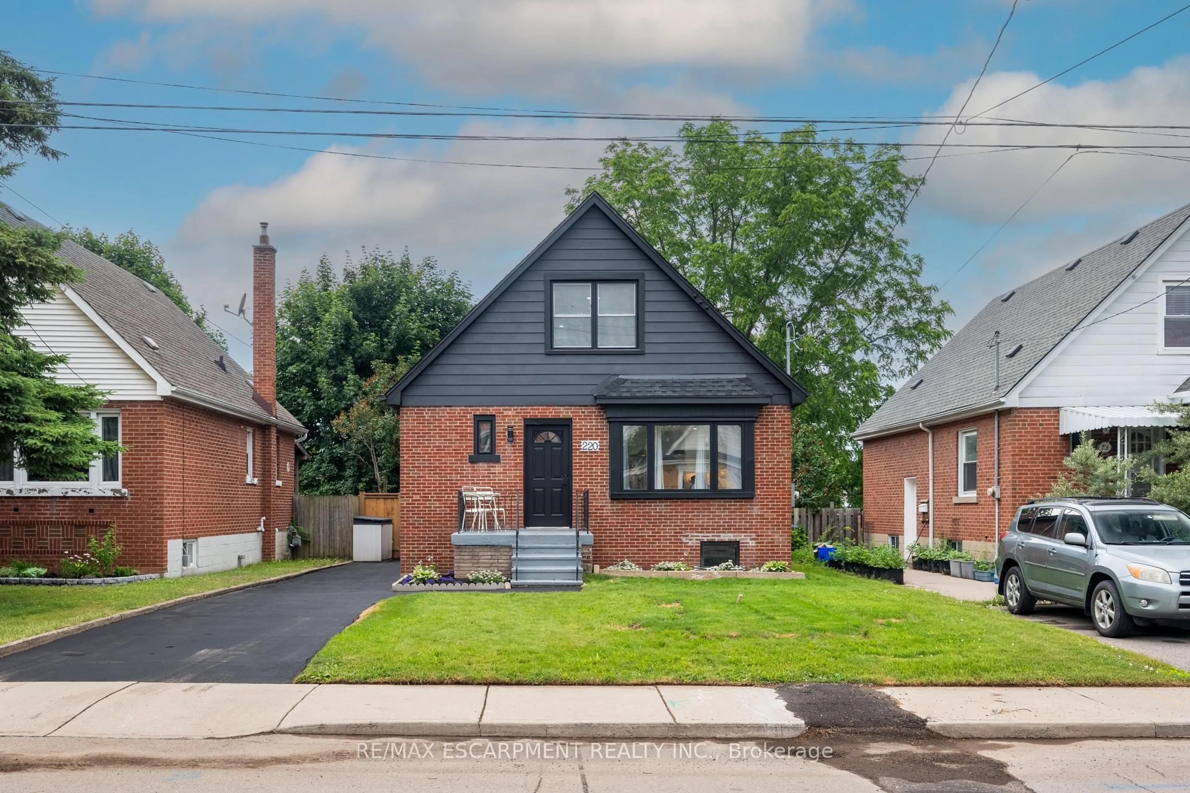 Home with brick exterior material, street for 220 Holmesdale Ave, Hamilton Ontario L8K 3M7