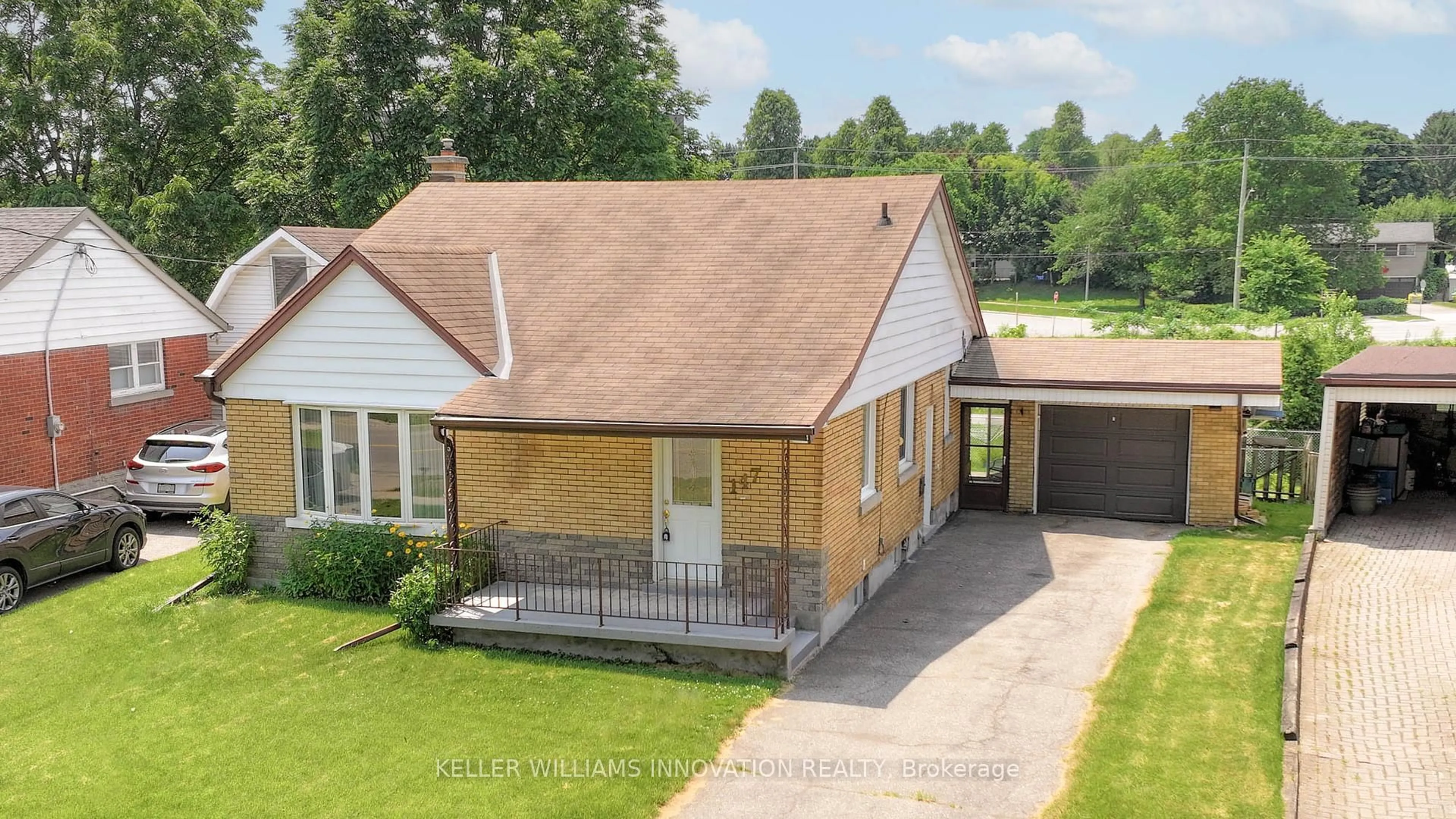A pic from outside/outdoor area/front of a property/back of a property/a pic from drone, street for 147 Clark Ave, Kitchener Ontario N2C 1Y1