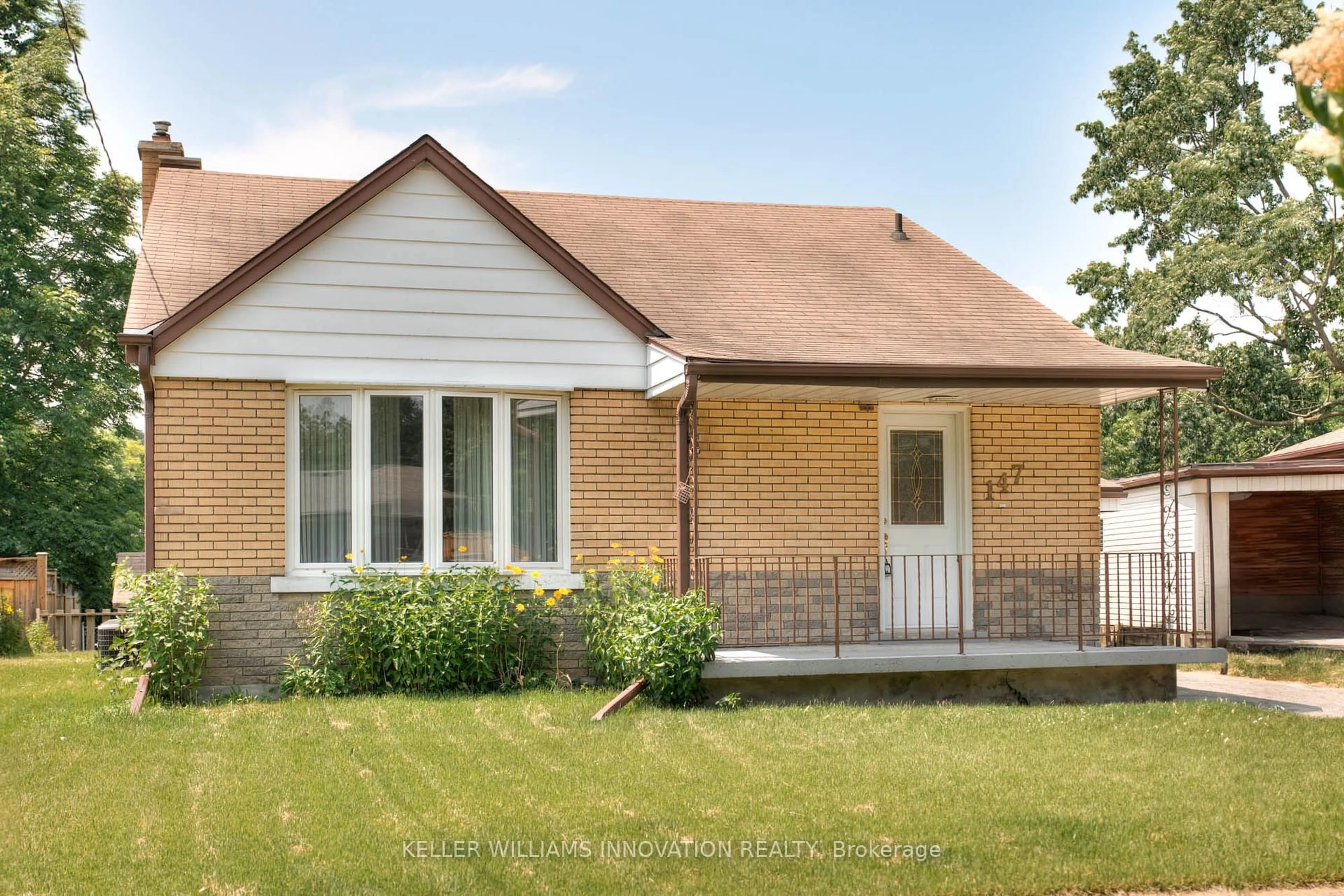 Home with brick exterior material, street for 147 Clark Ave, Kitchener Ontario N2C 1Y1