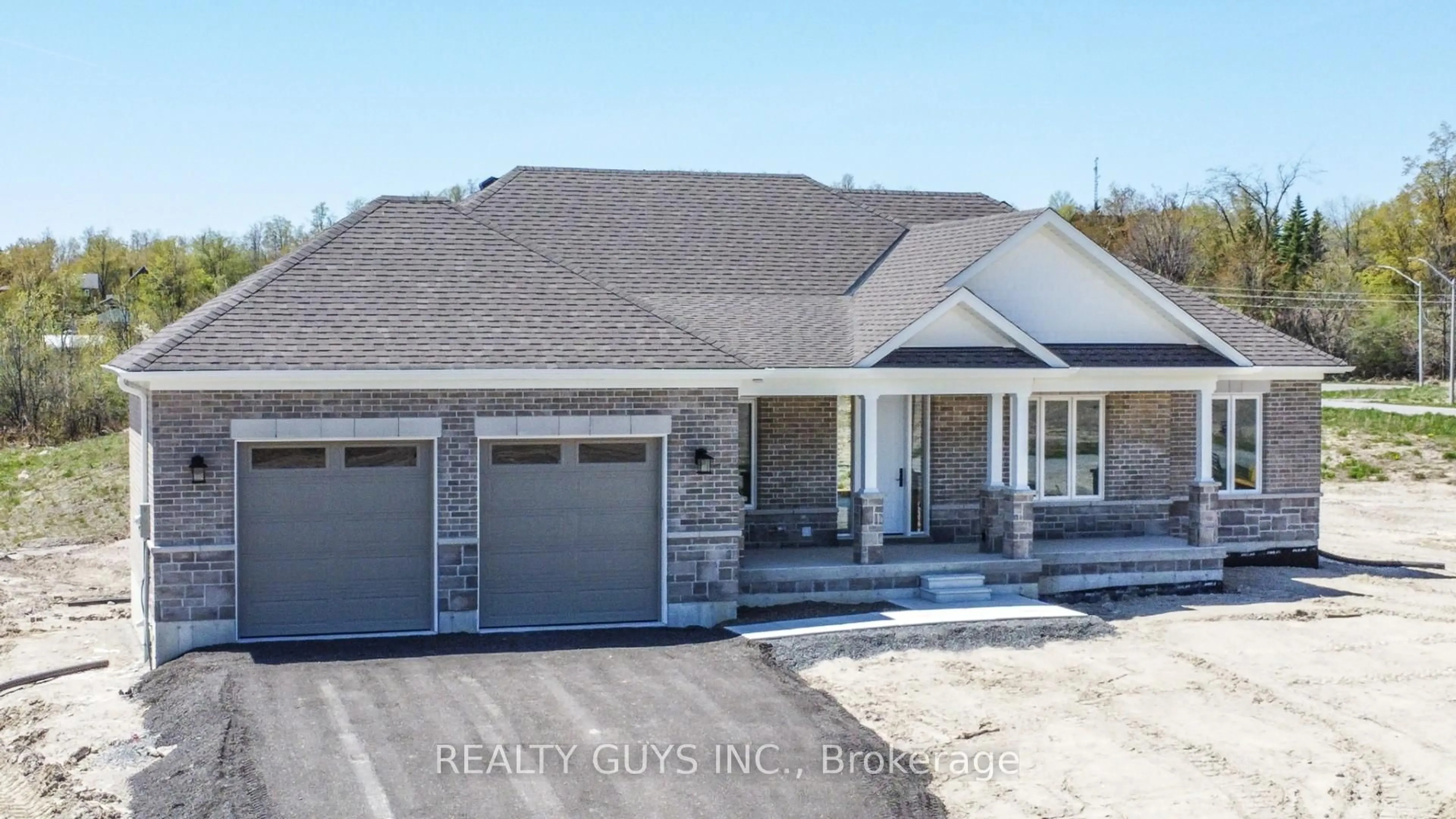 Home with brick exterior material, building for 2418 GWENDOLYN Crt, Cavan Monaghan Ontario L0A 1C0