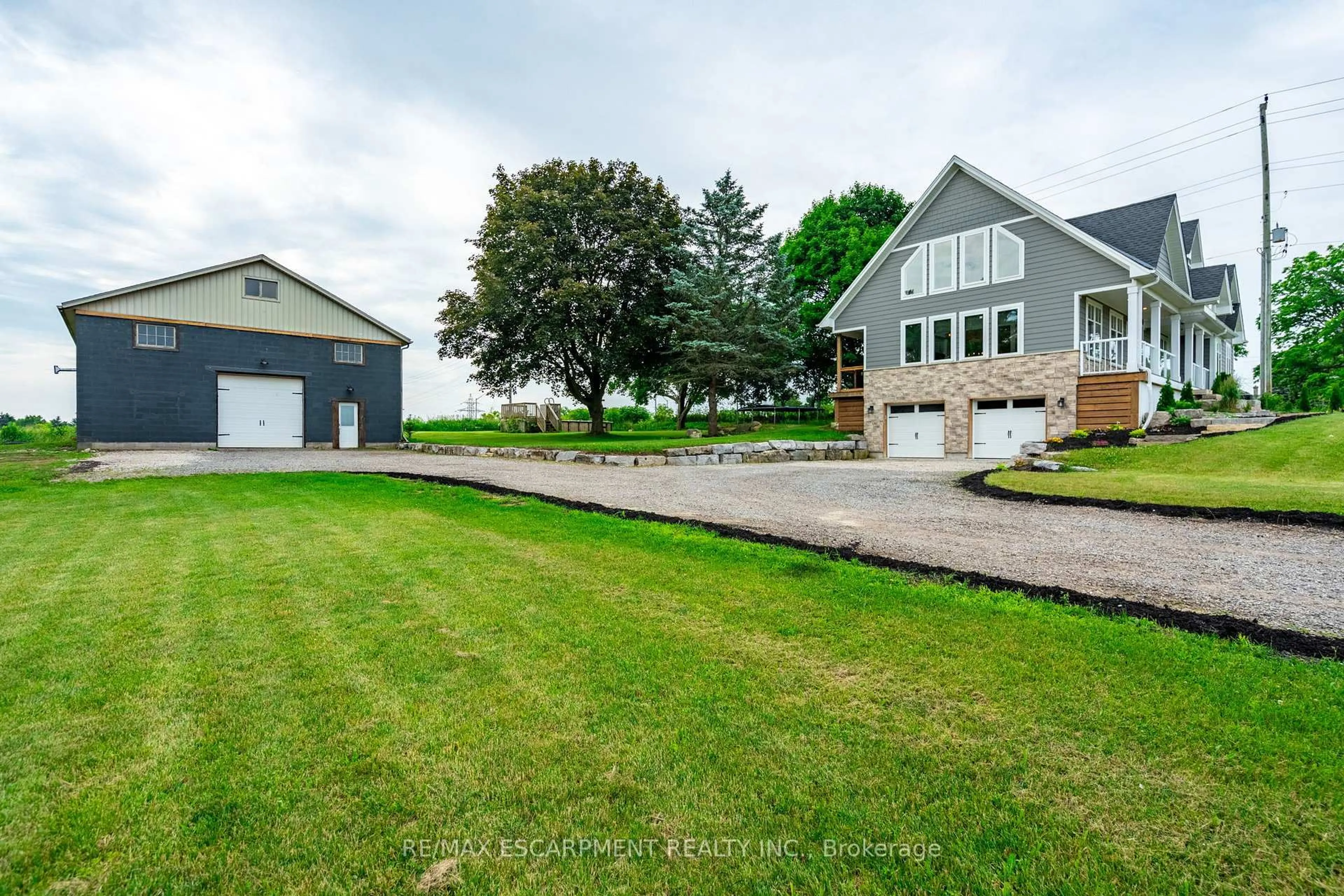 A pic from outside/outdoor area/front of a property/back of a property/a pic from drone, water/lake/river/ocean view for 4 Concession 11 Rd, Hamilton Ontario L8B 1H8