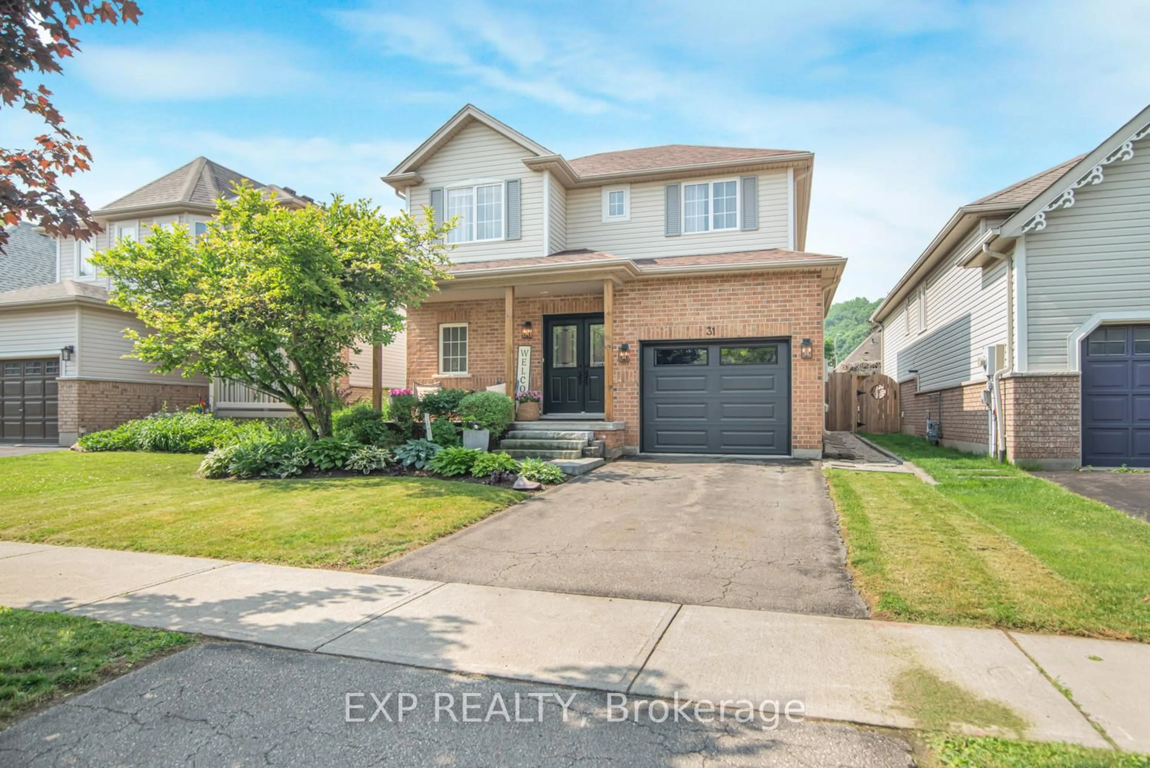 Home with brick exterior material, street for 31 Griffith Dr, Grimsby Ontario L3M 5L2