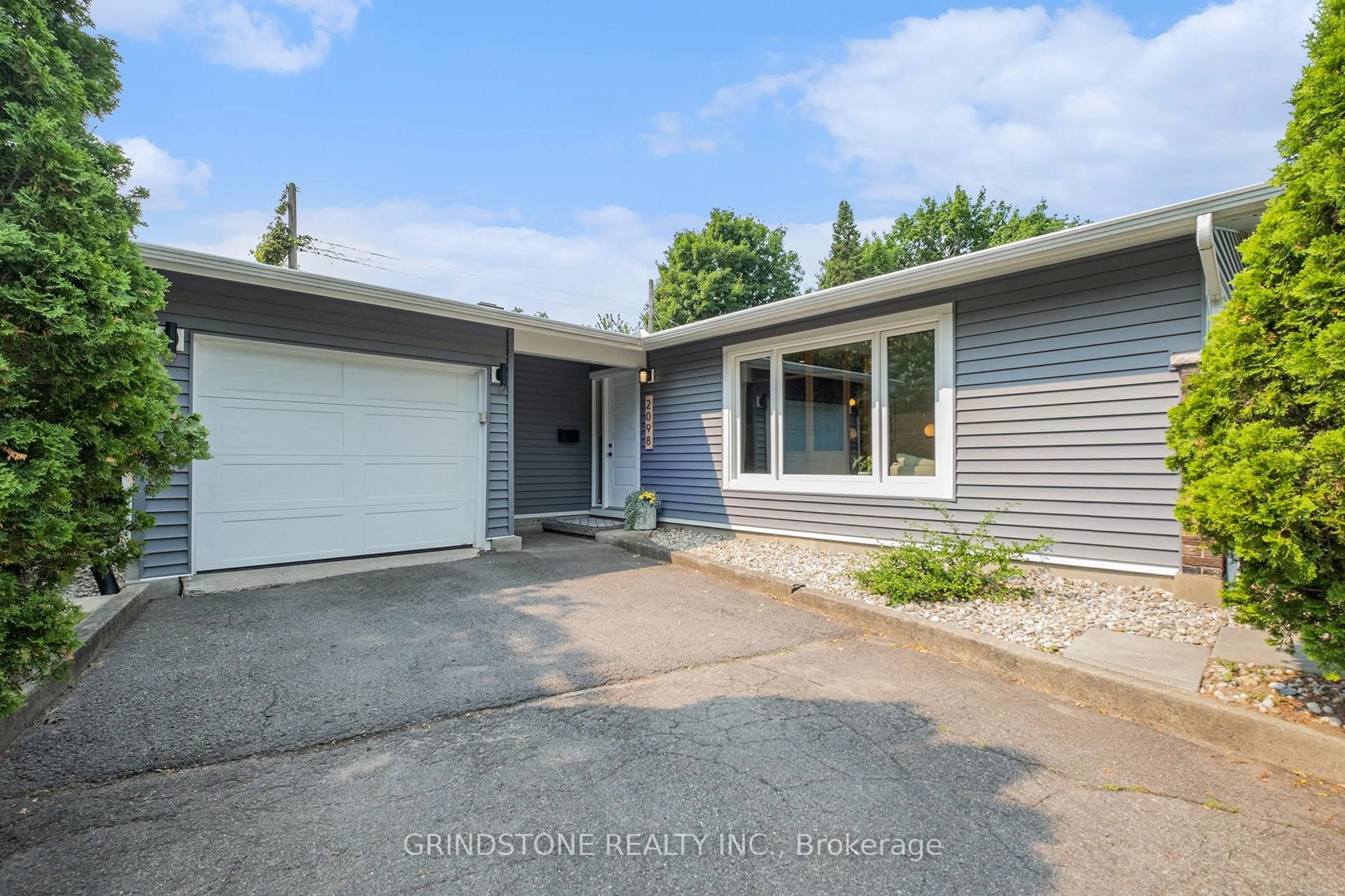 Home with vinyl exterior material, street for 2098 Delmar Dr, Ottawa Ontario K1H 5R1