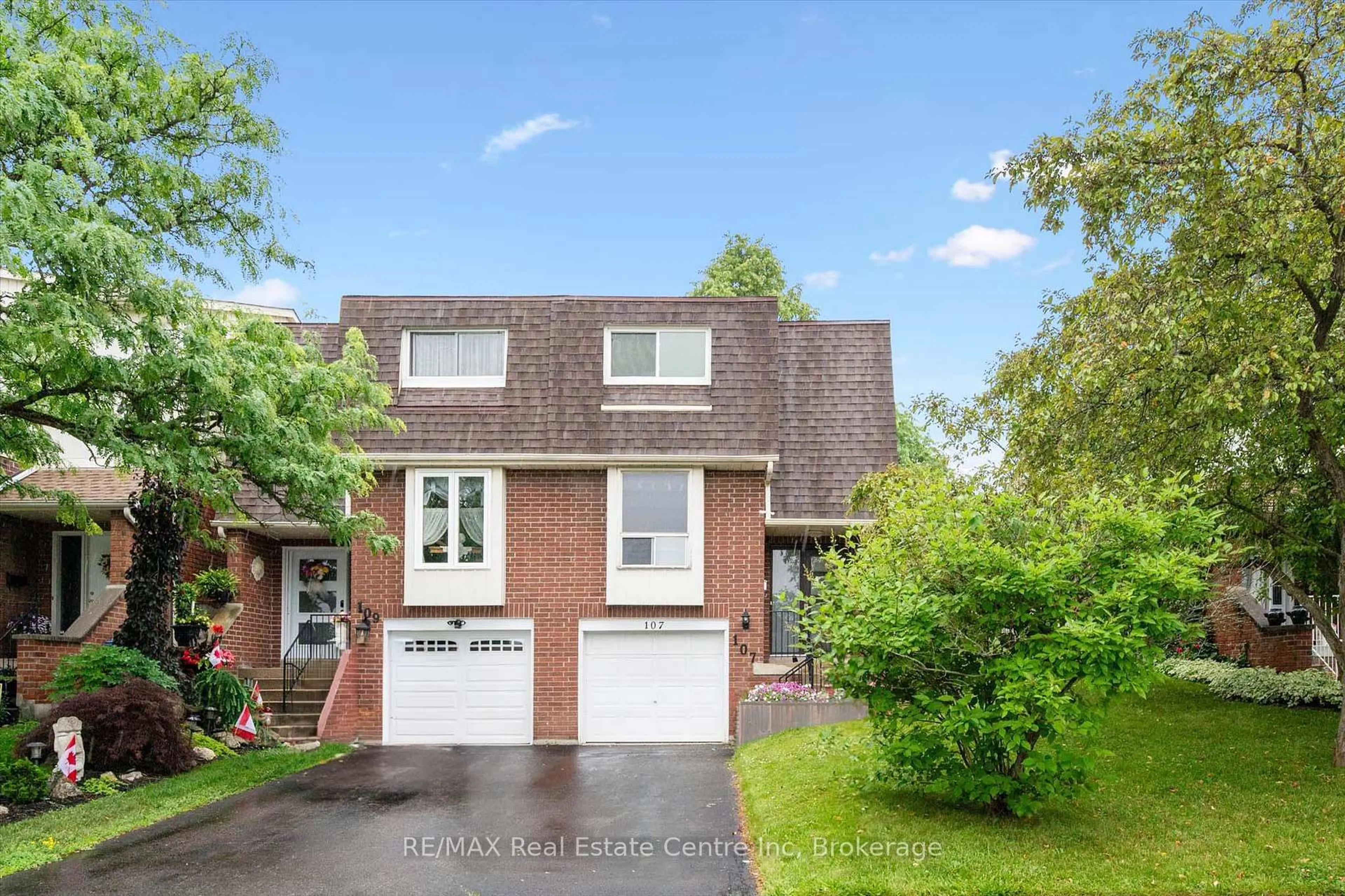 Home with brick exterior material, street for 107 Dovercliffe Rd, Guelph Ontario N1G 3A5