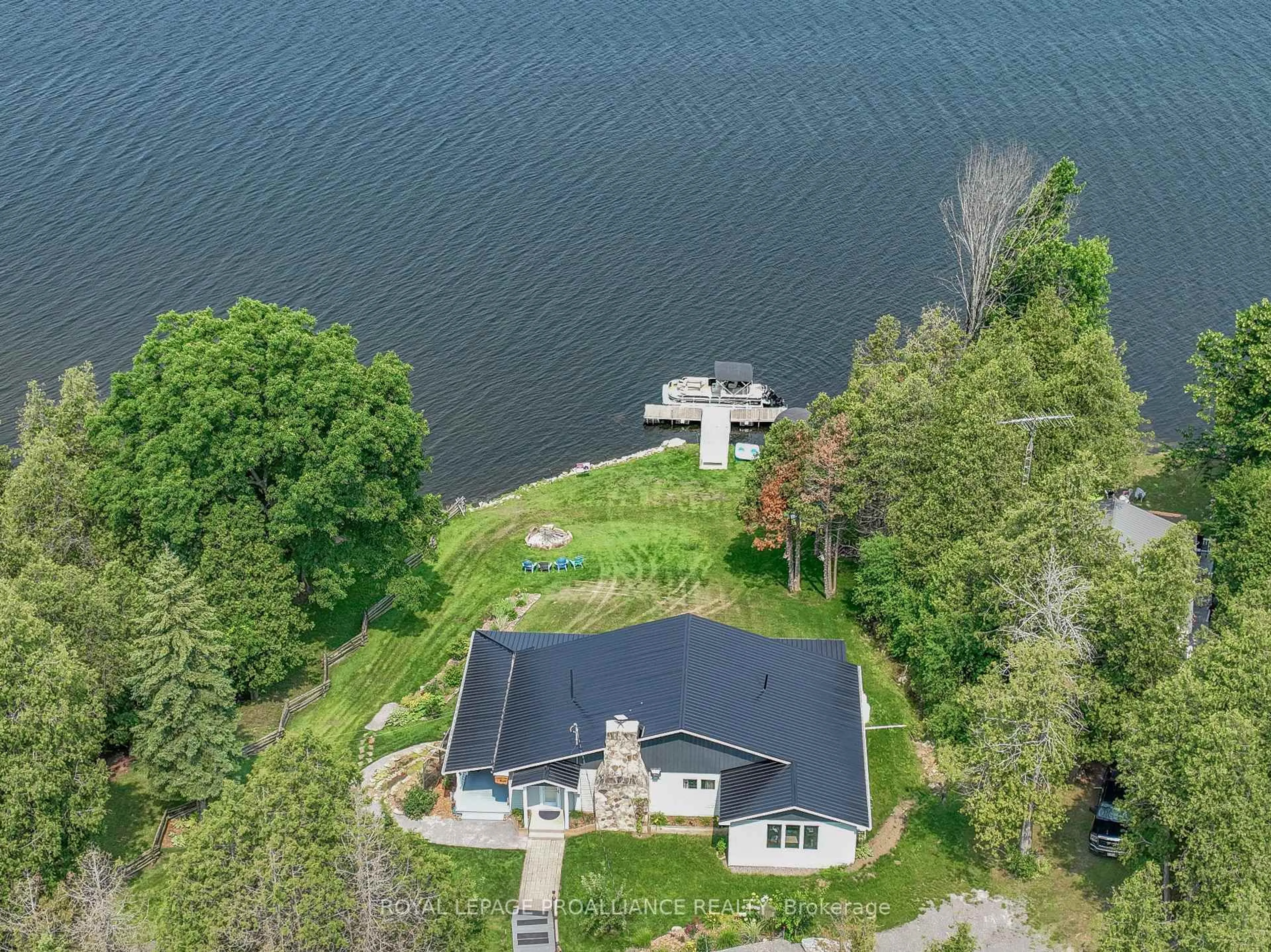 A pic from outside/outdoor area/front of a property/back of a property/a pic from drone, water/lake/river/ocean view for 40 Chant Terr, Front of Yonge Ontario K0E 1R0