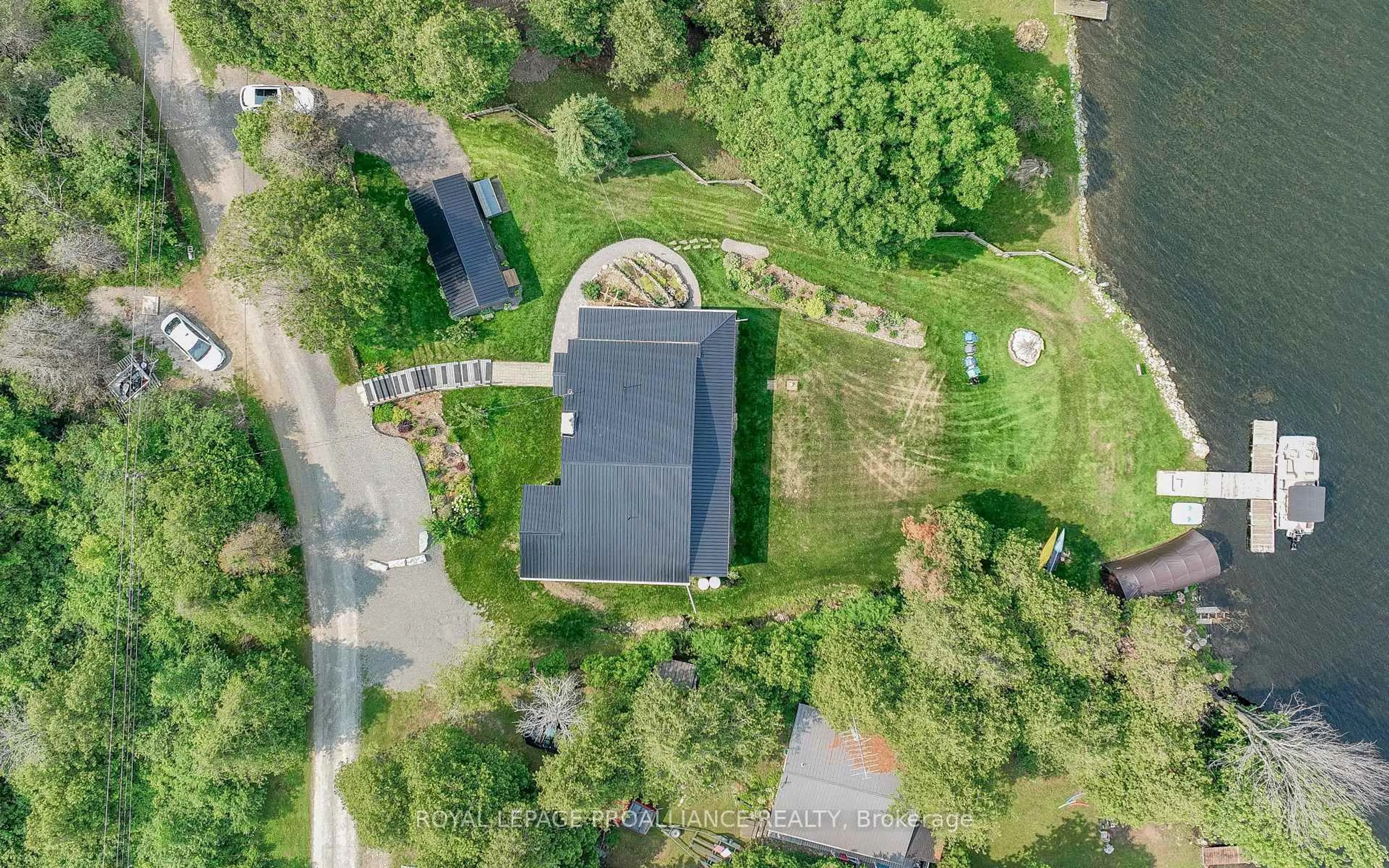 A pic from outside/outdoor area/front of a property/back of a property/a pic from drone, street for 40 Chant Terr, Front of Yonge Ontario K0E 1R0