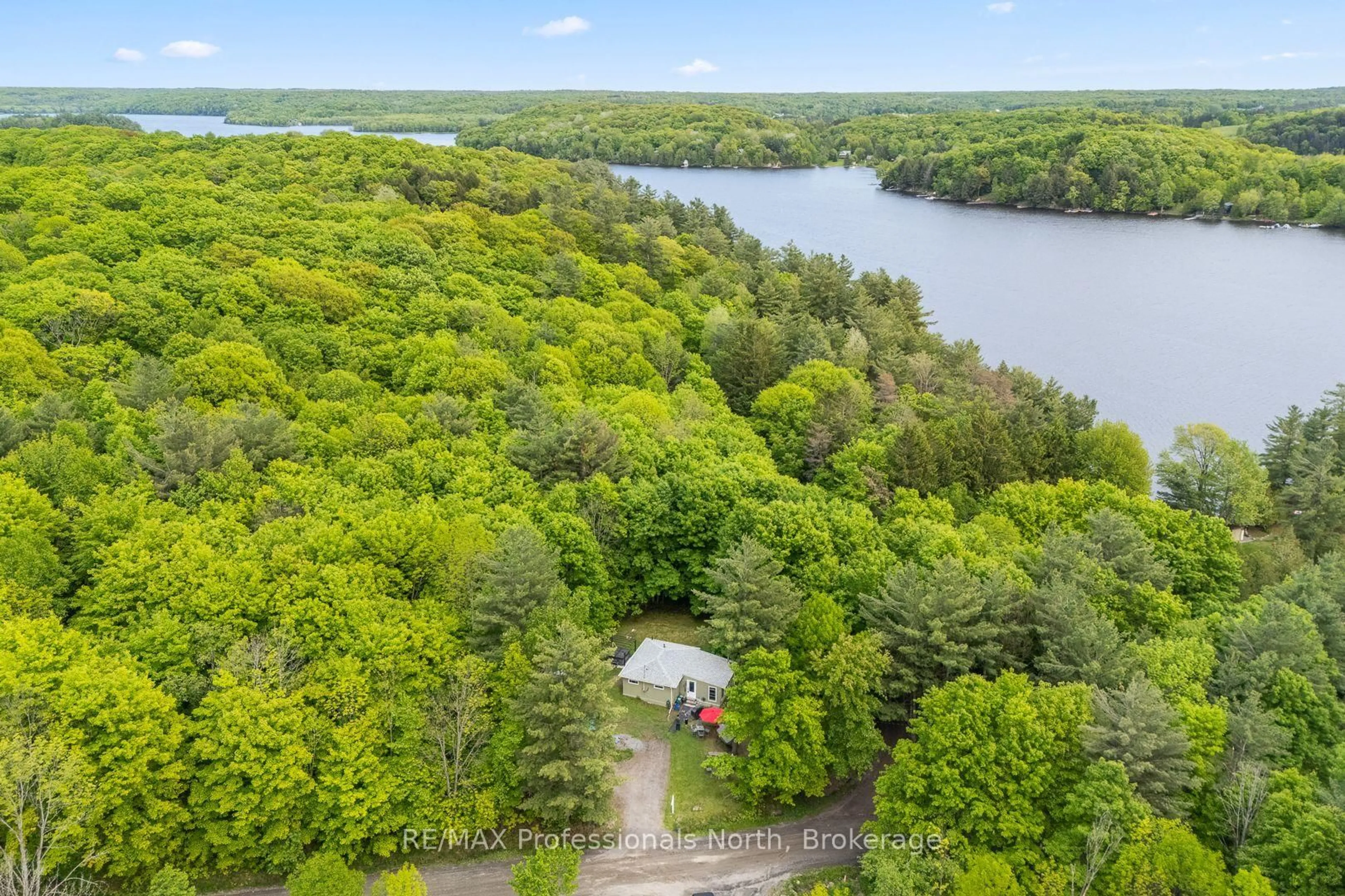 A pic from outside/outdoor area/front of a property/back of a property/a pic from drone, water/lake/river/ocean view for 1053 Cutler Rd, Muskoka Lakes Ontario P0B 1M0