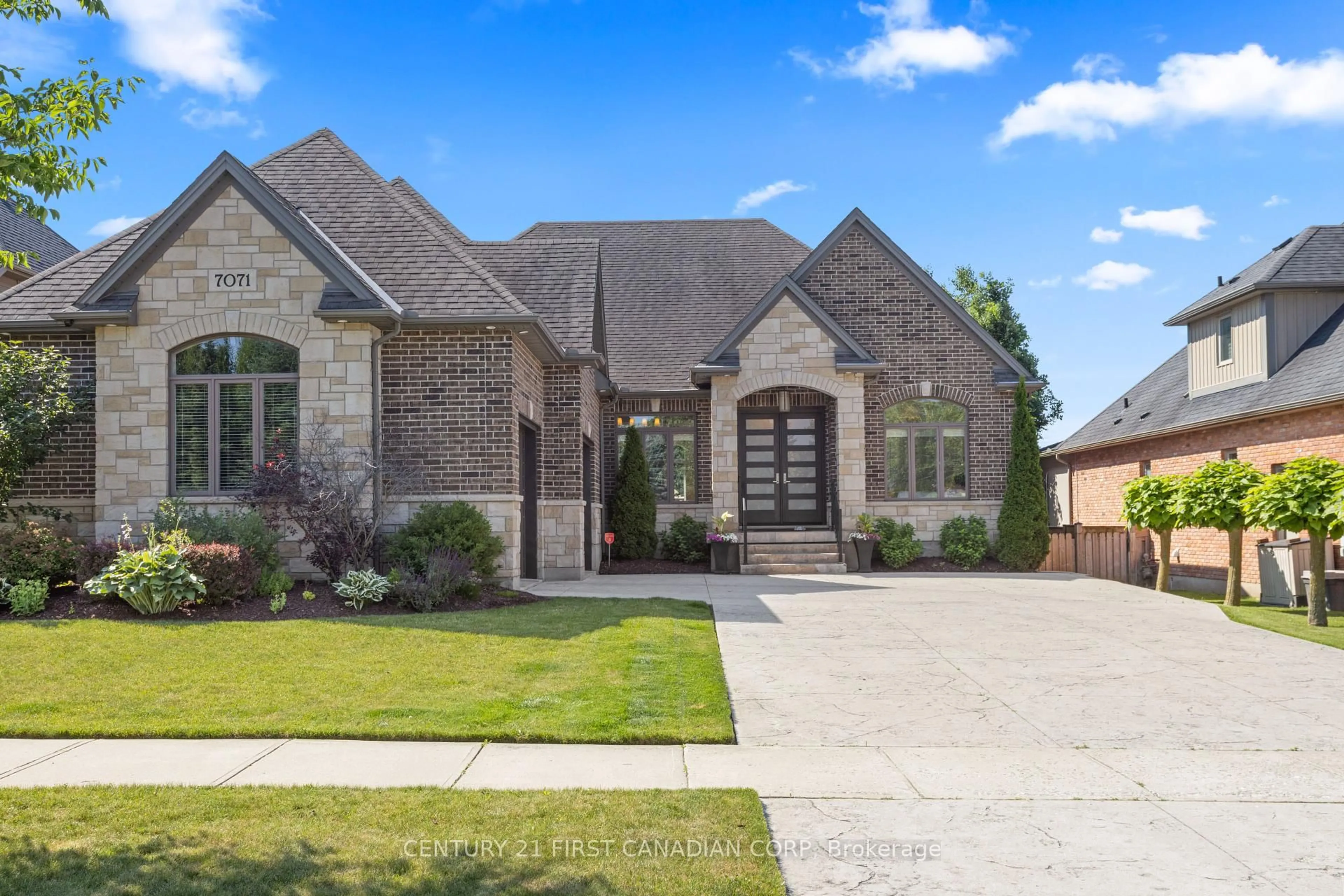 Home with brick exterior material, street for 7071 Clayton Walk, London South Ontario N6P 0A1