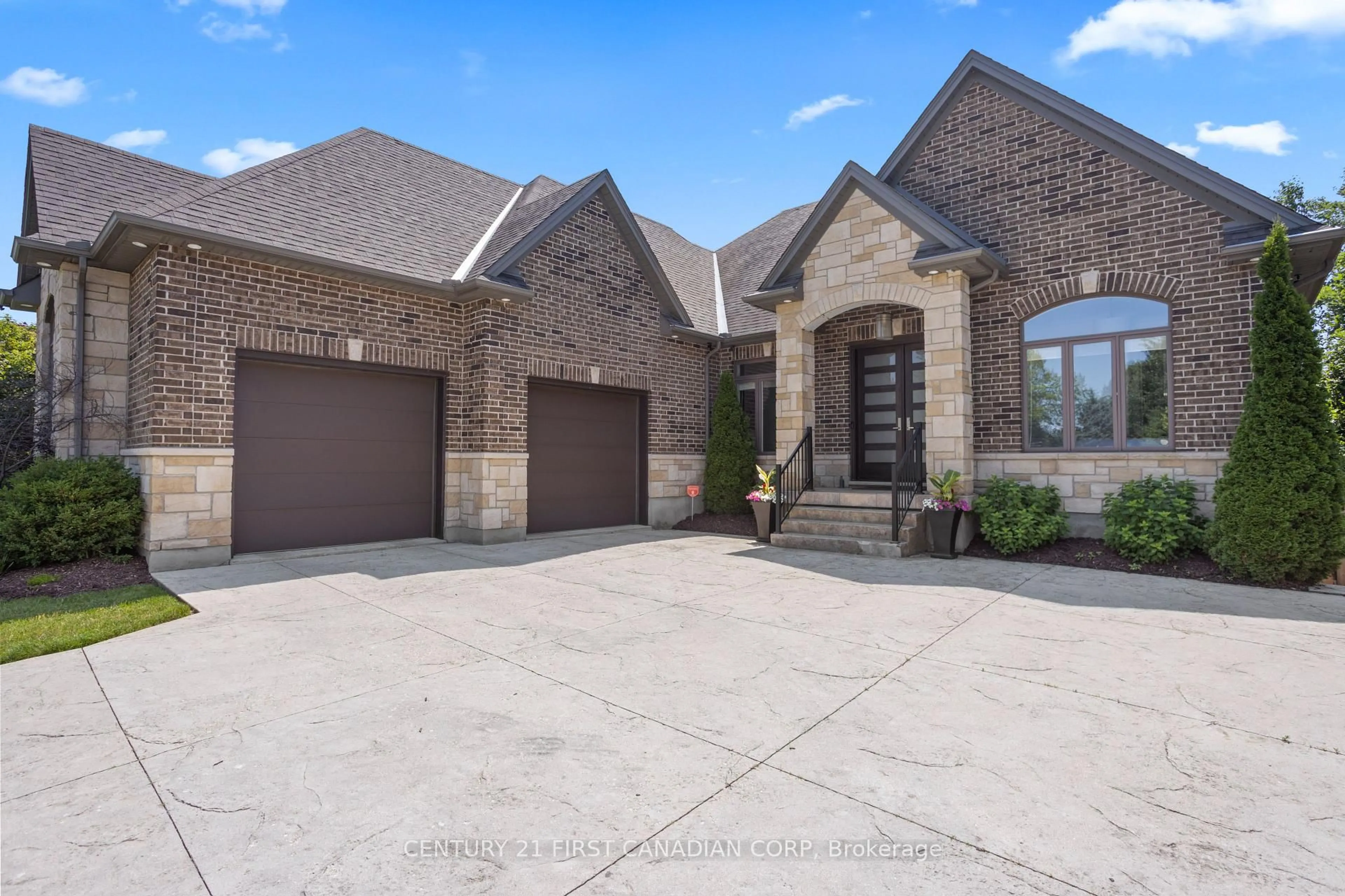 Home with brick exterior material, street for 7071 Clayton Walk, London South Ontario N6P 0A1
